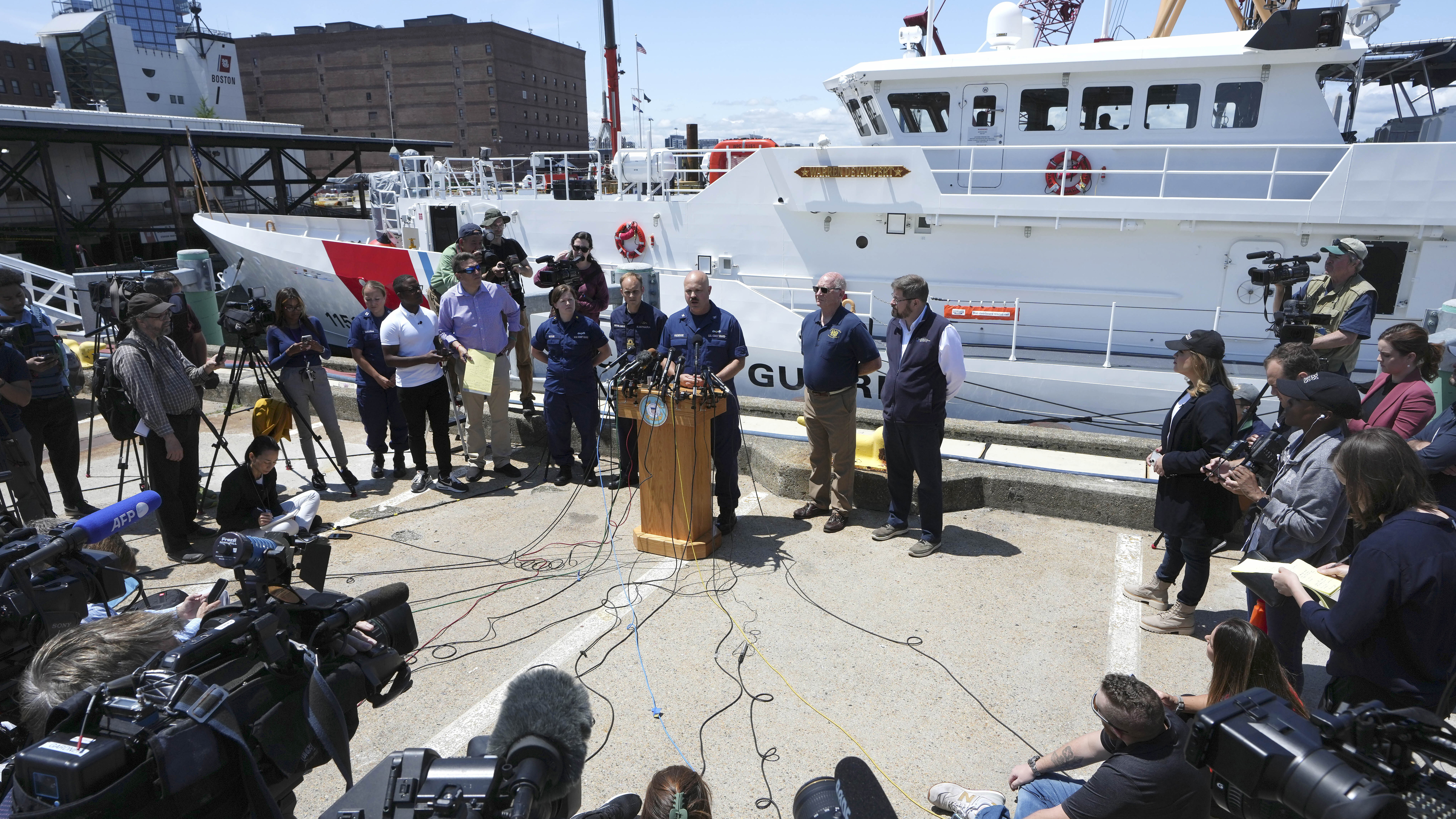 US Coast Guard Capt. Jamie Frederick, faces reporters during a news conference, at Coast Guard Base Boston.