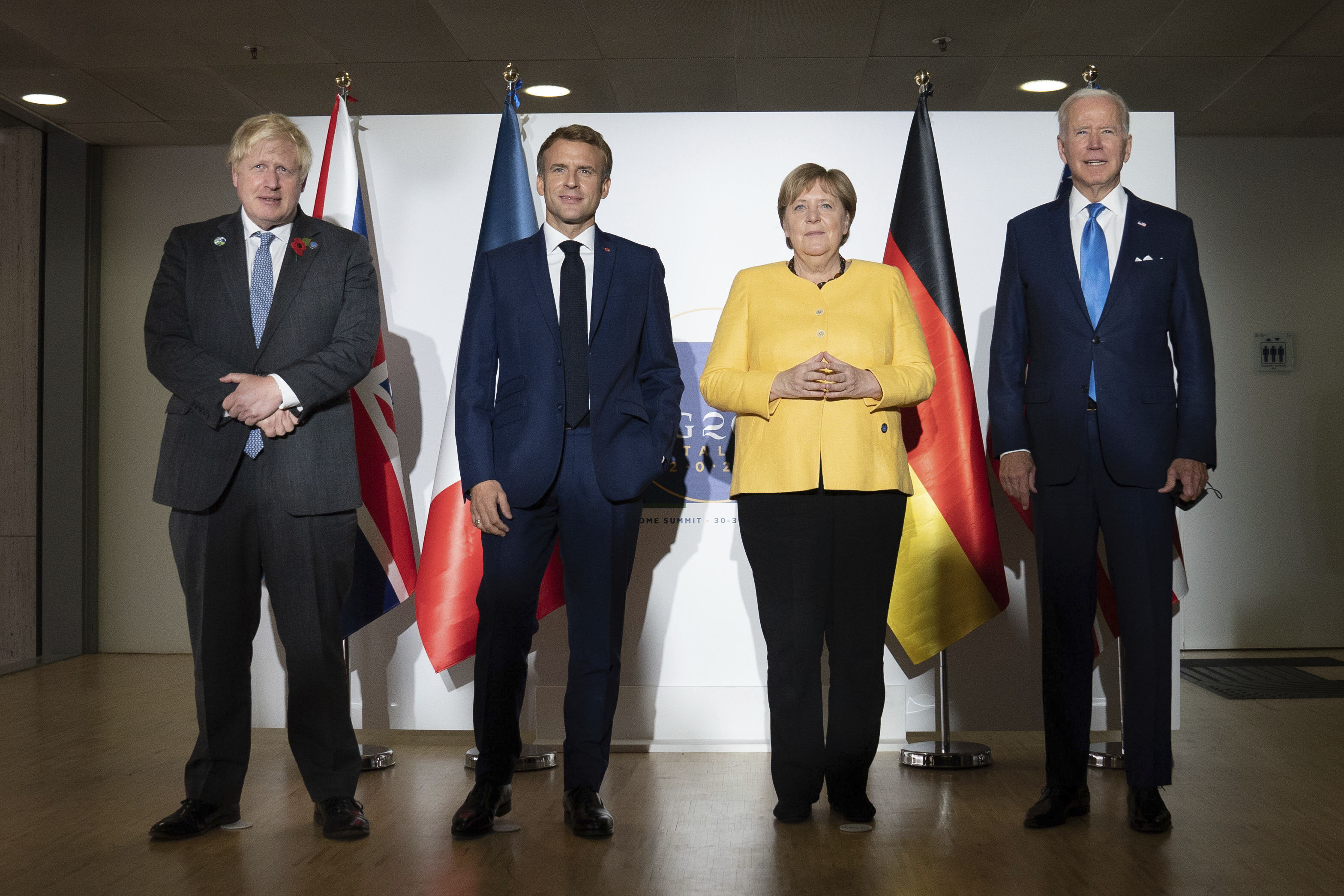 From left: British Prime Minister Boris Johnson, French President Emmanuel Macron, German Chancellor Angela Merkel and U.S. President Joe Biden at the G20 summit in Rome. 