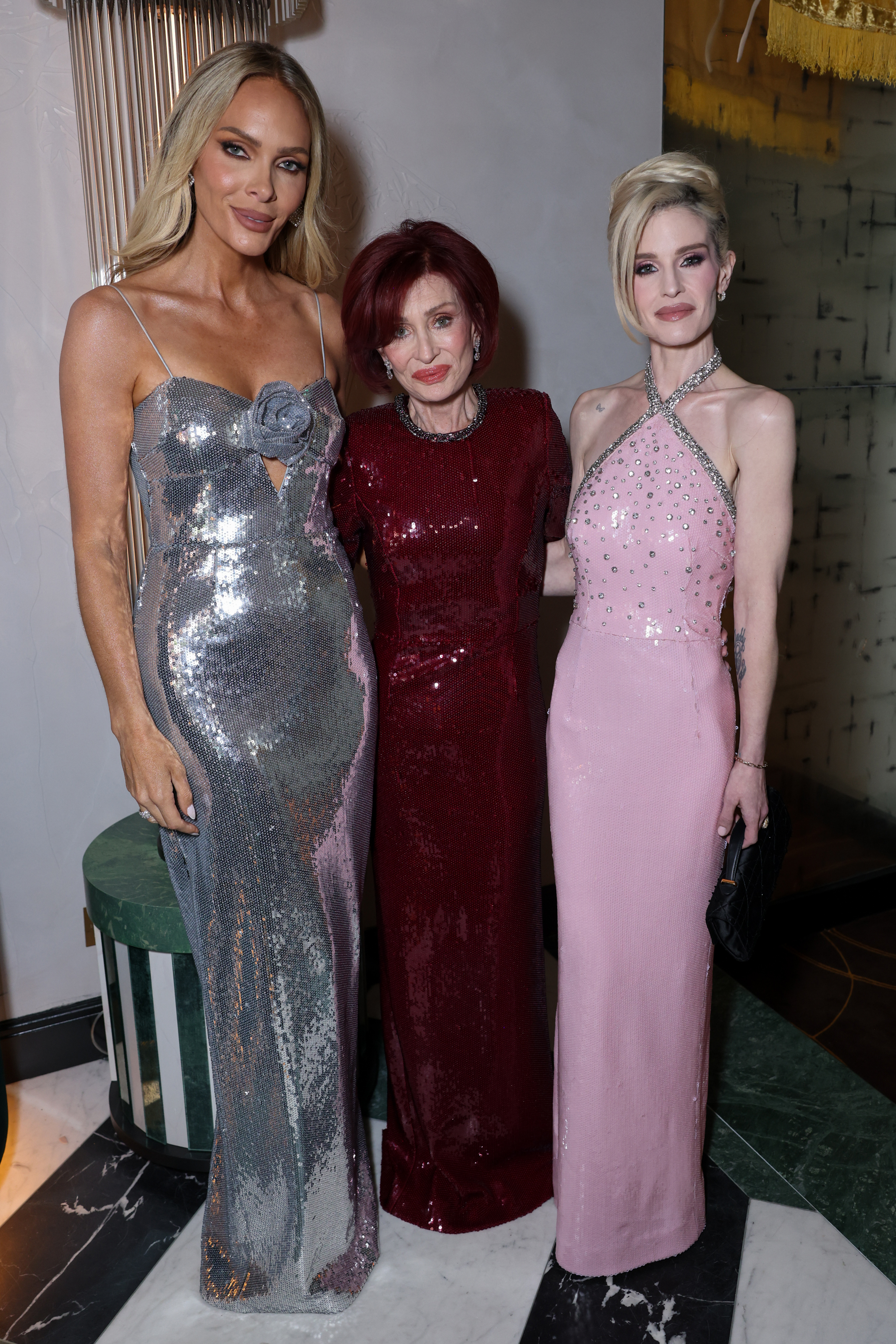 LONDON, ENGLAND - NOVEMBER 26: (L to R) Rebecca Vallance, Sharon Osbourne and Kelly Osbourne attend a special cocktail hosted by Rebecca Vallance at Aki London on November 26, 2025 in London, England. (Photo by Max Cisotti/Dave Benett/Getty Images for Rebecca Vallance)