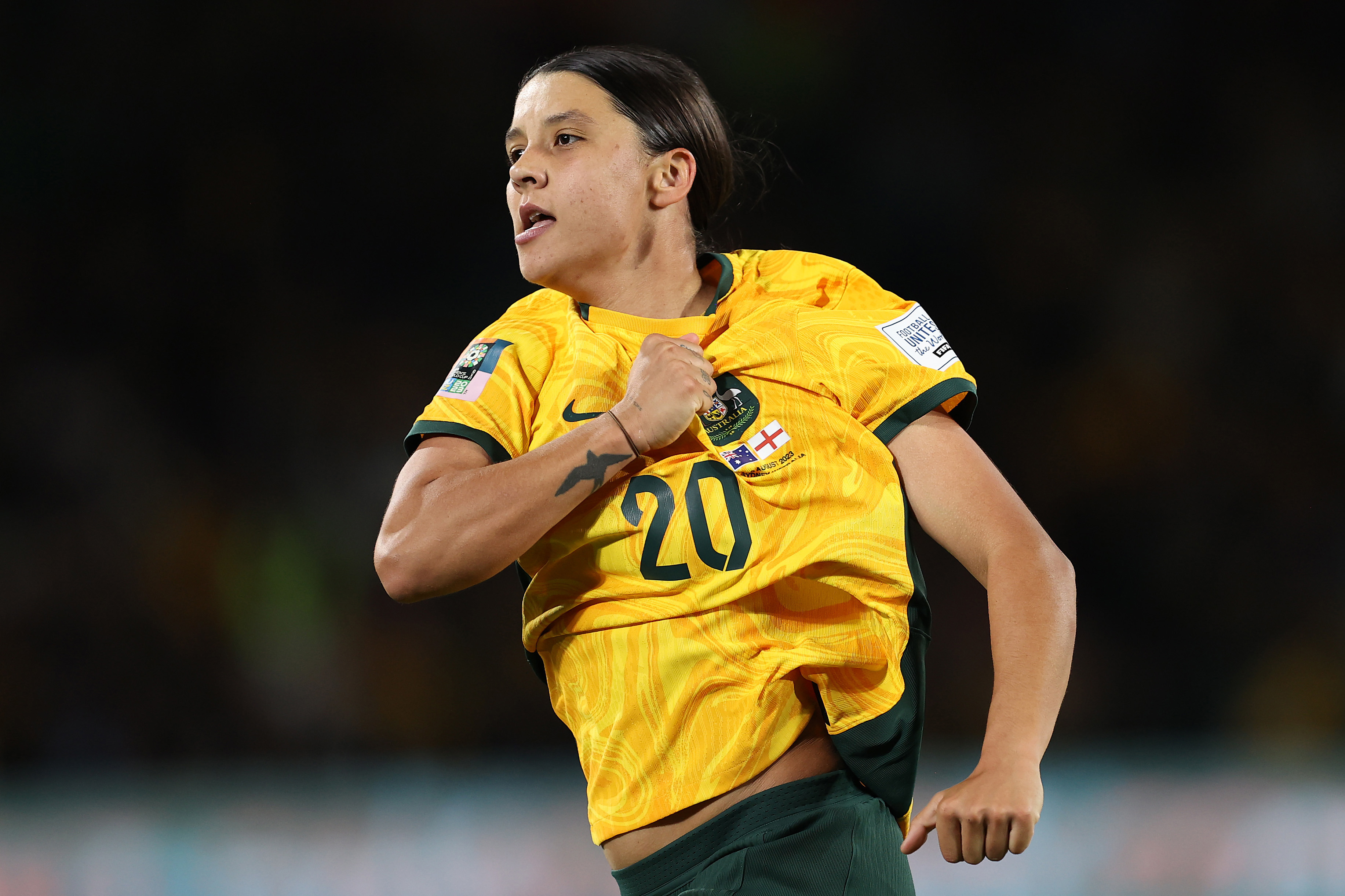 Sam Kerr celebrates after scoring Australia's first goal.