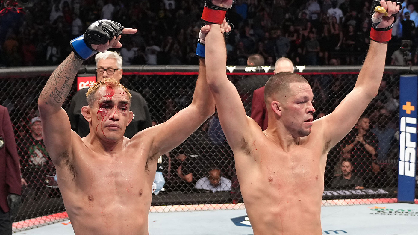 Tony Ferguson congratulates Nate Diaz after Diaz's final UFC fight