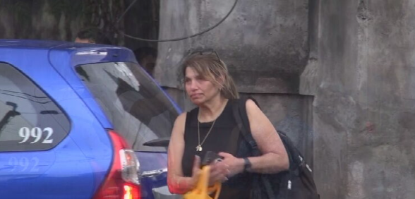 A relative of Zivan Radmanovic outside a morgue in Bali.