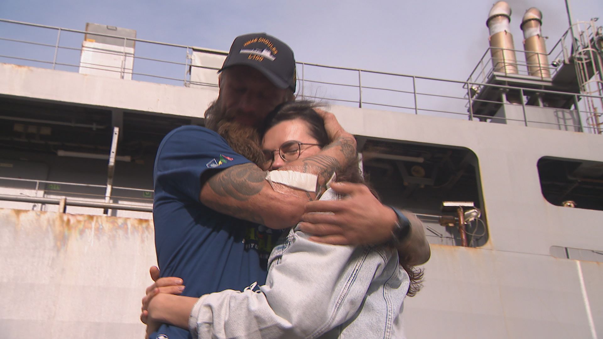 Rower who was caught in waters near Cyclone Alfred reunited with family in Sydney