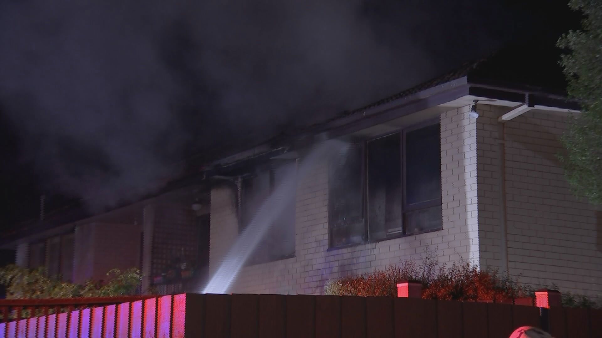 A﻿ woman has died after flames engulfed a house in Melbourne this morning