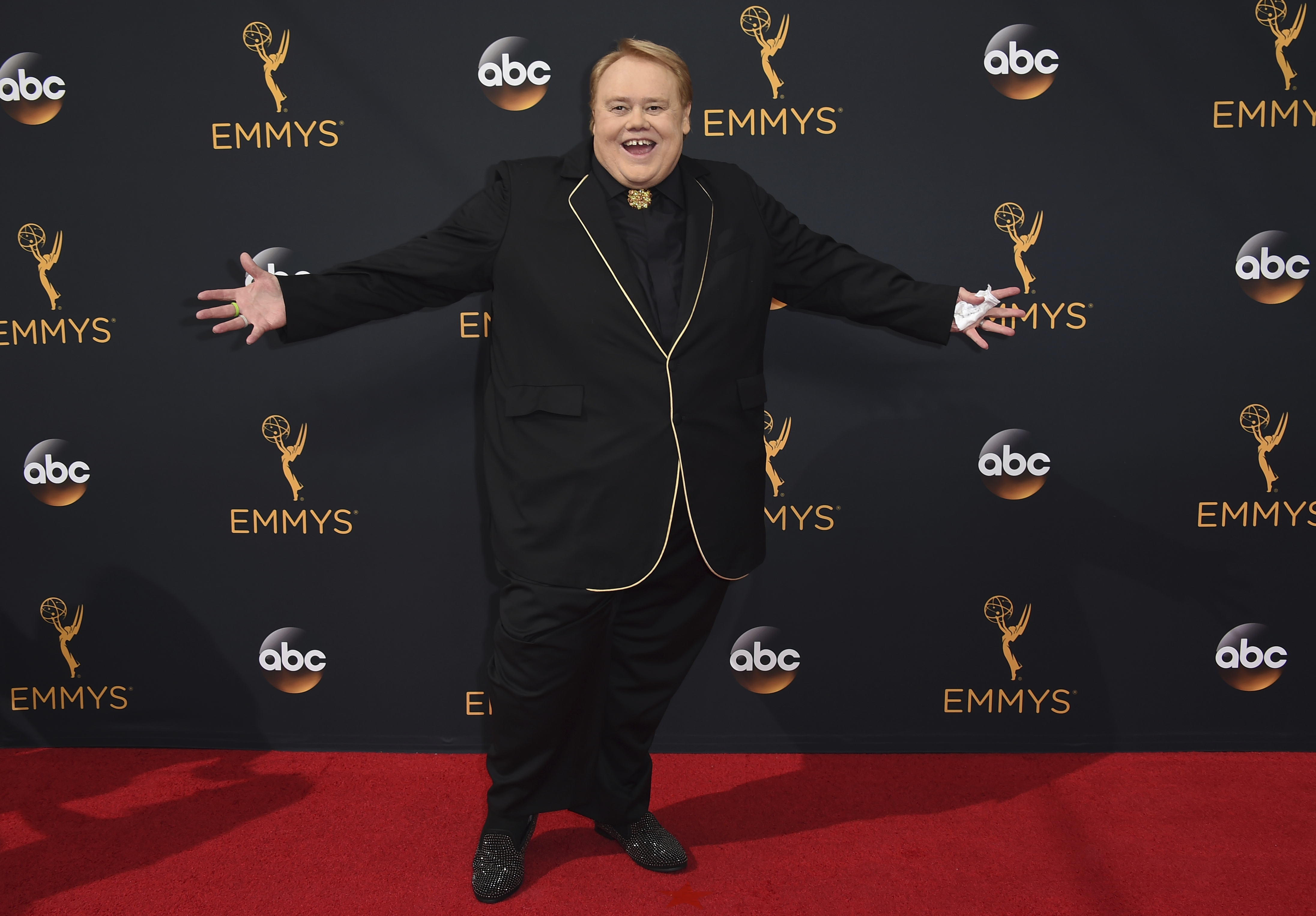 Louie Anderson arrives at the 68th Primetime Emmy Awards on Sunday, Sept. 18, 2016, in Los Angeles.