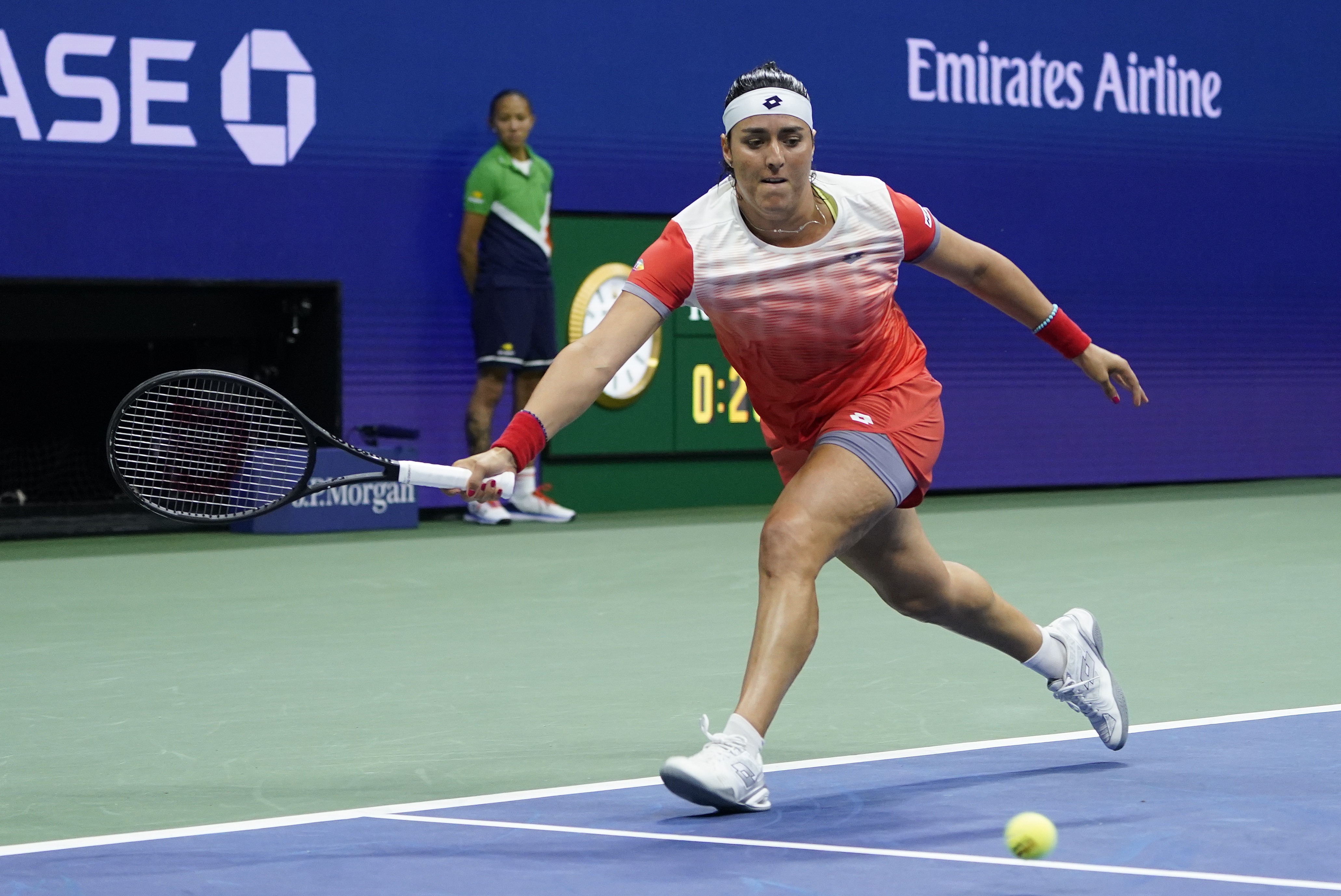 Ons Jabeur, of Tunisia, returns a shot to Caroline Garcia, of France, during the semifinals of the U.S. Open tennis championships, Thursday, Sept. 8, 2022, in New York. (AP Photo/John Minchillo)