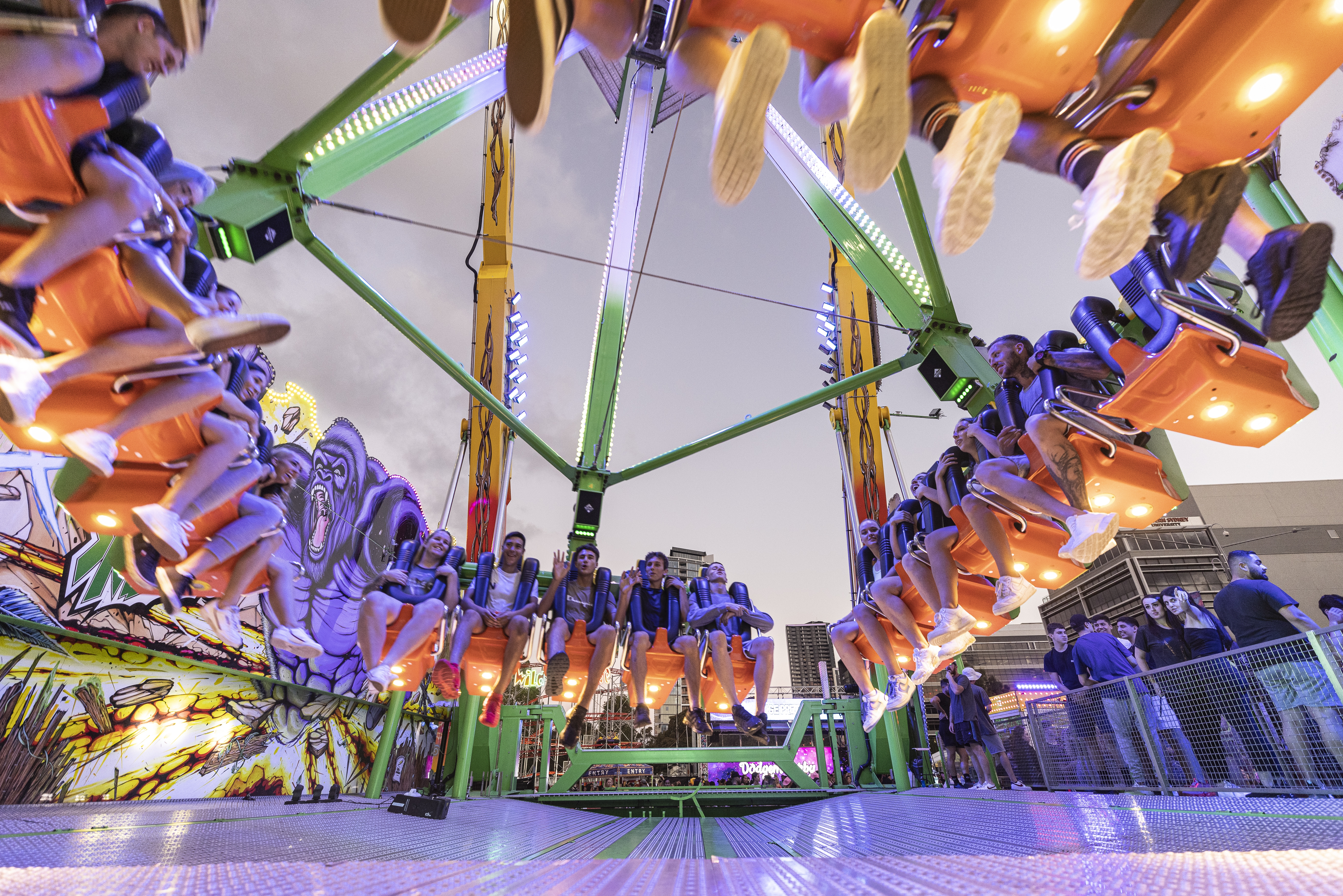 People ride The Beast, which reaches speeds of 120km/h and swings 38 metres high while doing a 360 degree spin, at the The Sydney Royal Easter Show on 05 April, 2021. Photo: Brook Mitchell