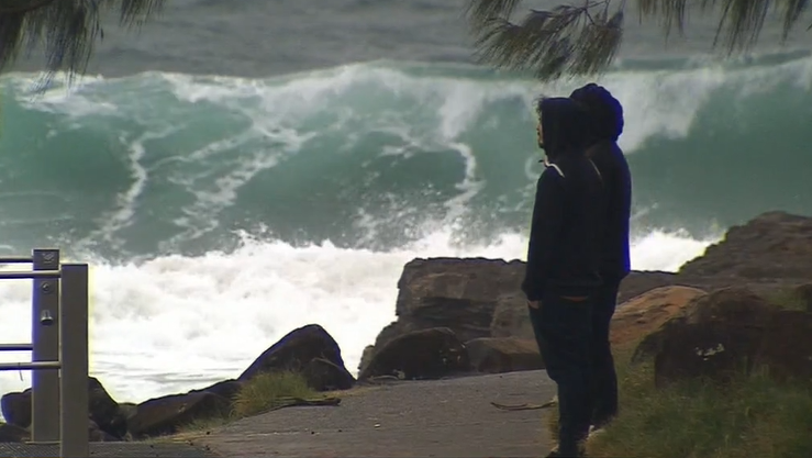 More than 1000 kilometres of coastline is under a hazardous surf warning, stretching from Fraser Island in Queensland down into the Hunter Coast in NSW. 