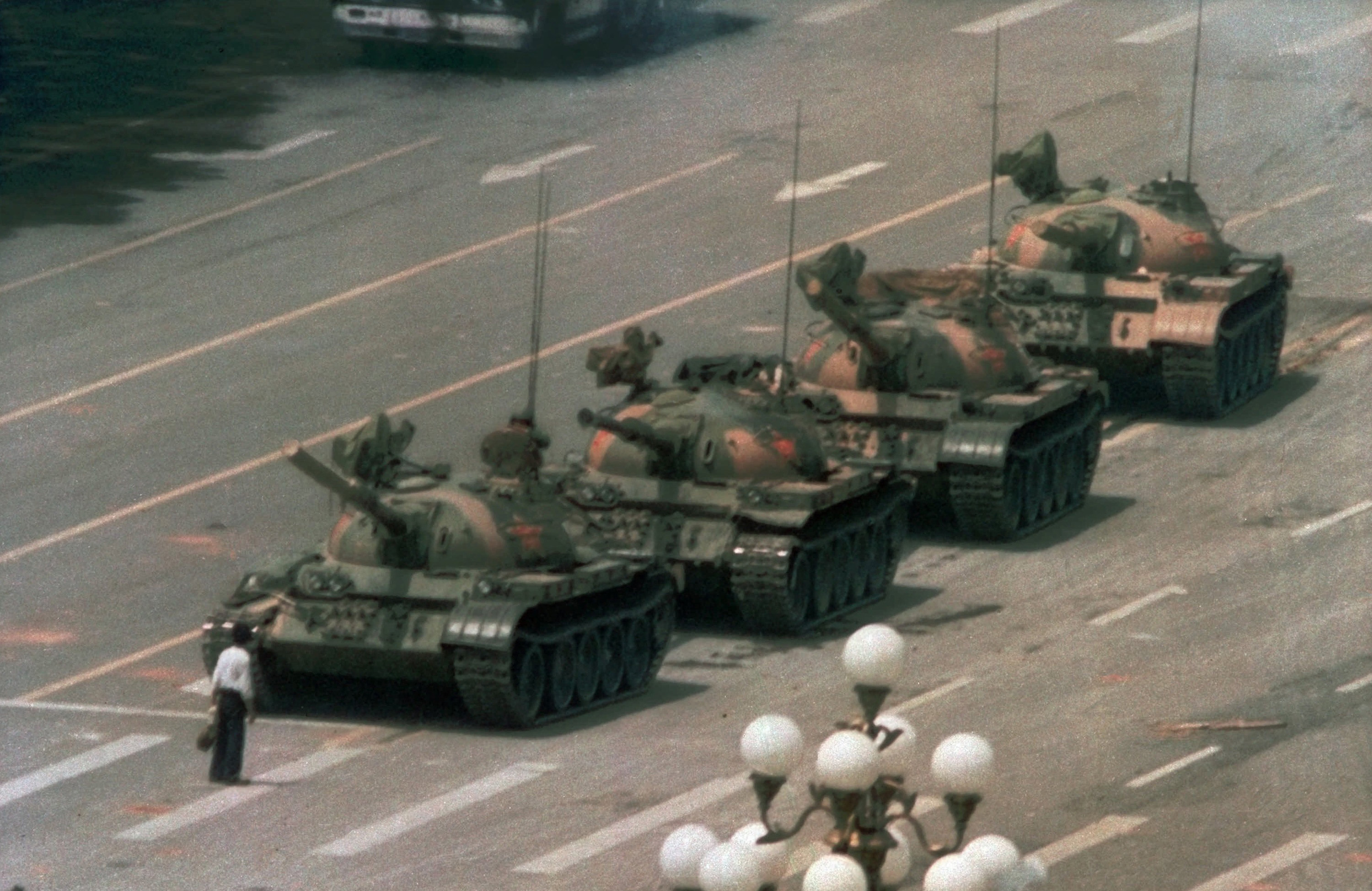 FILE - In this June 5, 1989 file photo, a man stands alone to block a line of tanks heading east on Beijing's Cangan Blvd. in Tiananmen Square. Microsoft Corp. blamed accidental human error for its Bing search engine briefly not showing image results for the search term tank man on the anniversary of the bloody military crackdown in Beijings Tiananmen Square in 1989. Users in different parts of the world, including the U.S., said Friday, June 4, 2021 that no image results were returned when th