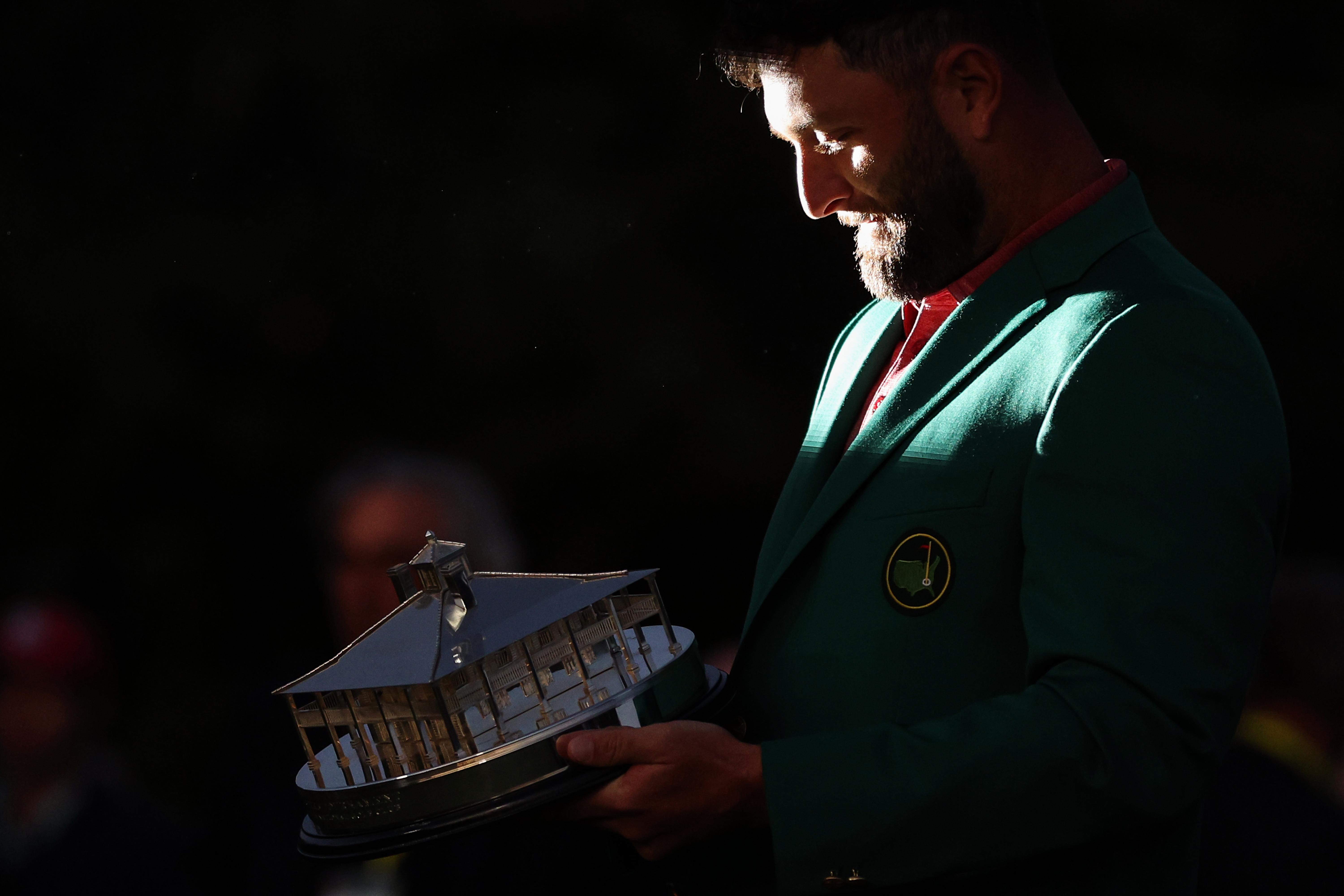 AUGUSTA, GEORGIA - APRIL 09: Jon Rahm of Spain celebrates with the Masters trophy during the Green Jacket Ceremony after winning the 2023 Masters Tournament at Augusta National Golf Club on April 9, 2023 in Augusta, Georgia. (Photo by Patrick Smith/Getty Images)