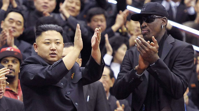 Kim Jong Un and Dennis Rodman applaud during a game between the Harlem Globetrotters team and North Korean University of Physical Education players. (AAP)