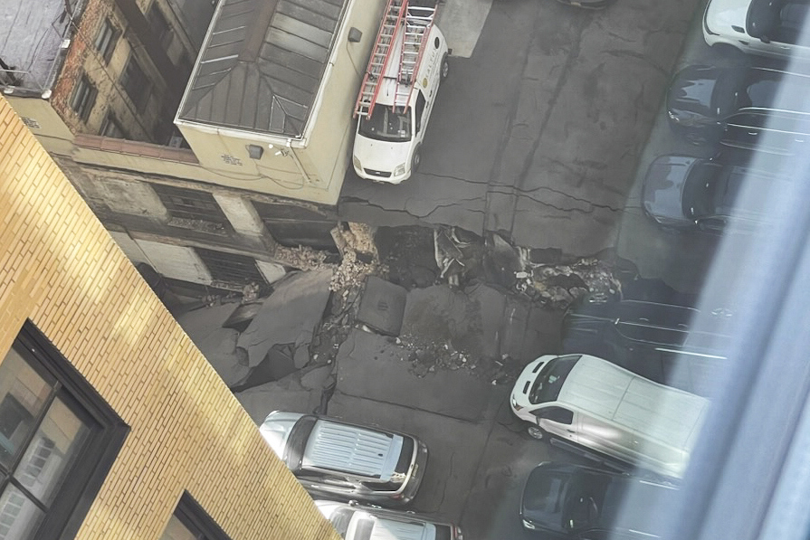 This photo provided by Charlie Franklin shows the partially collapsed parking garage in lower Manhattan.