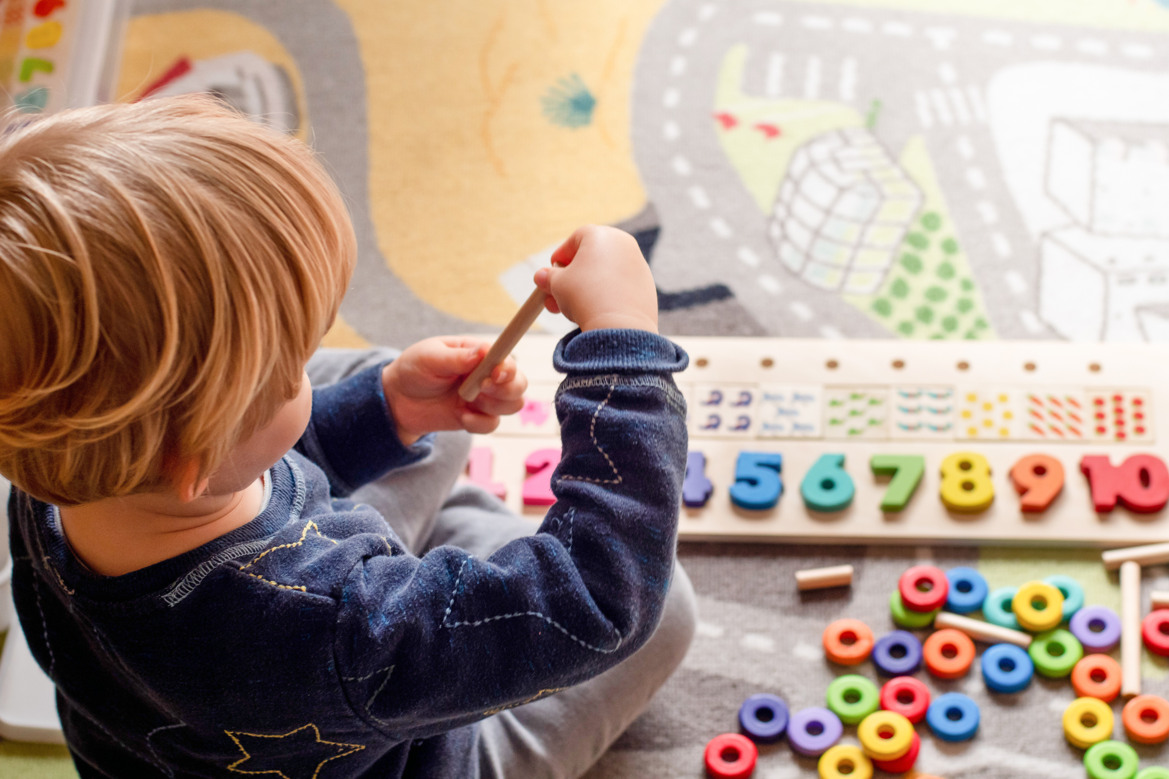 Preschool childcare centre toddler playing early education learning children