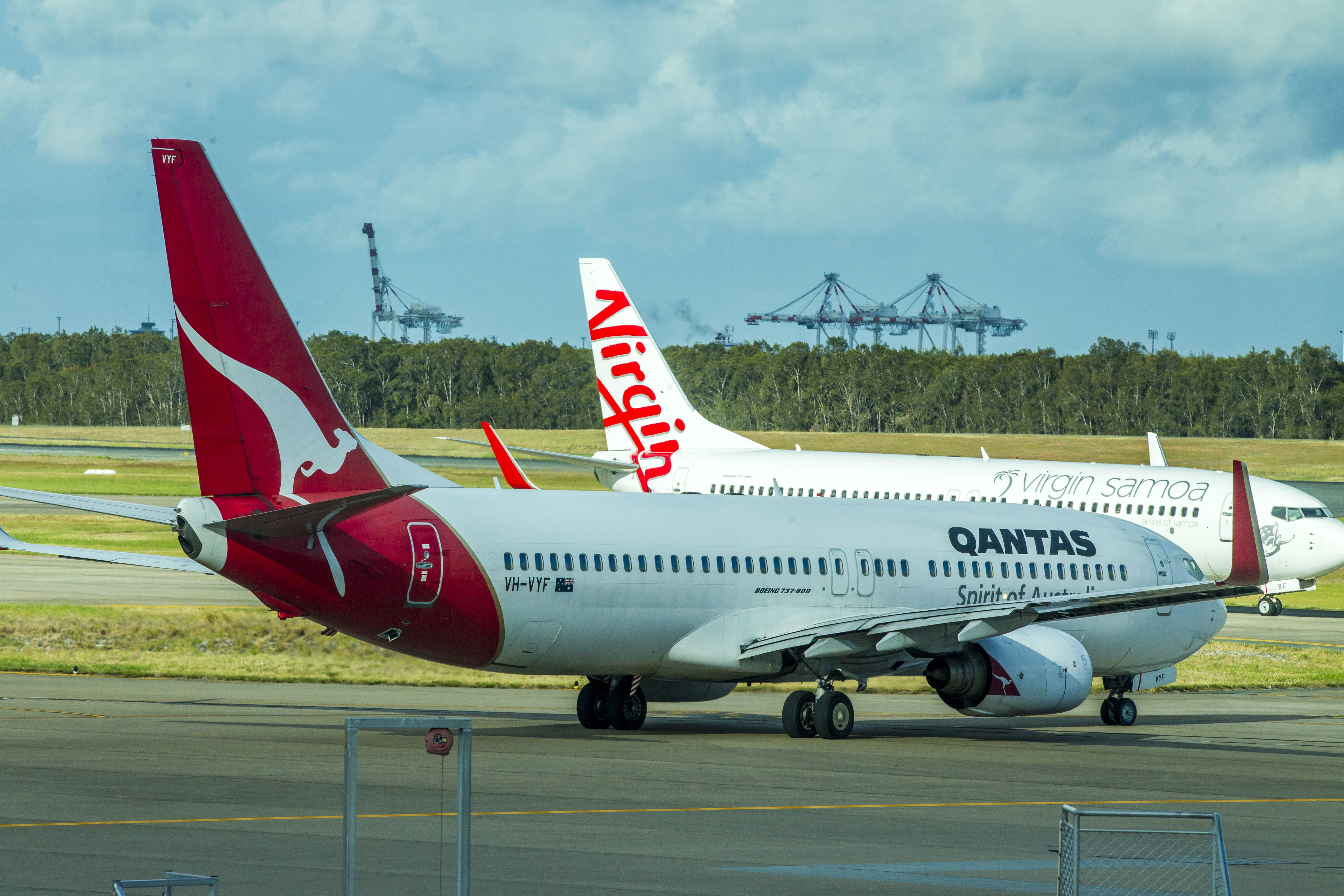 A Qantas and Virgin plane.