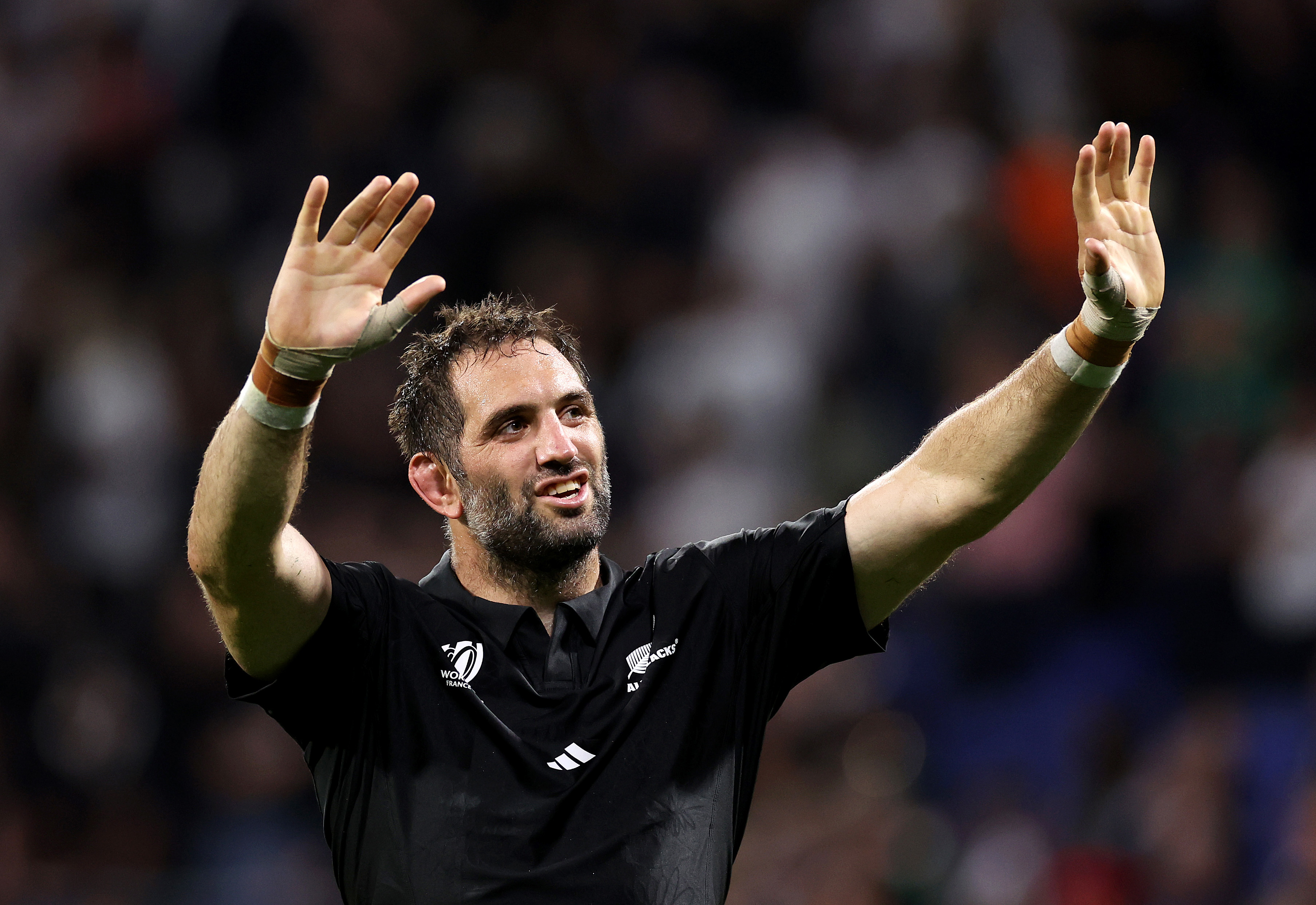 Sam Whitelock of New Zealand acknowledges the fans after overtaking Richie McCaw's record.