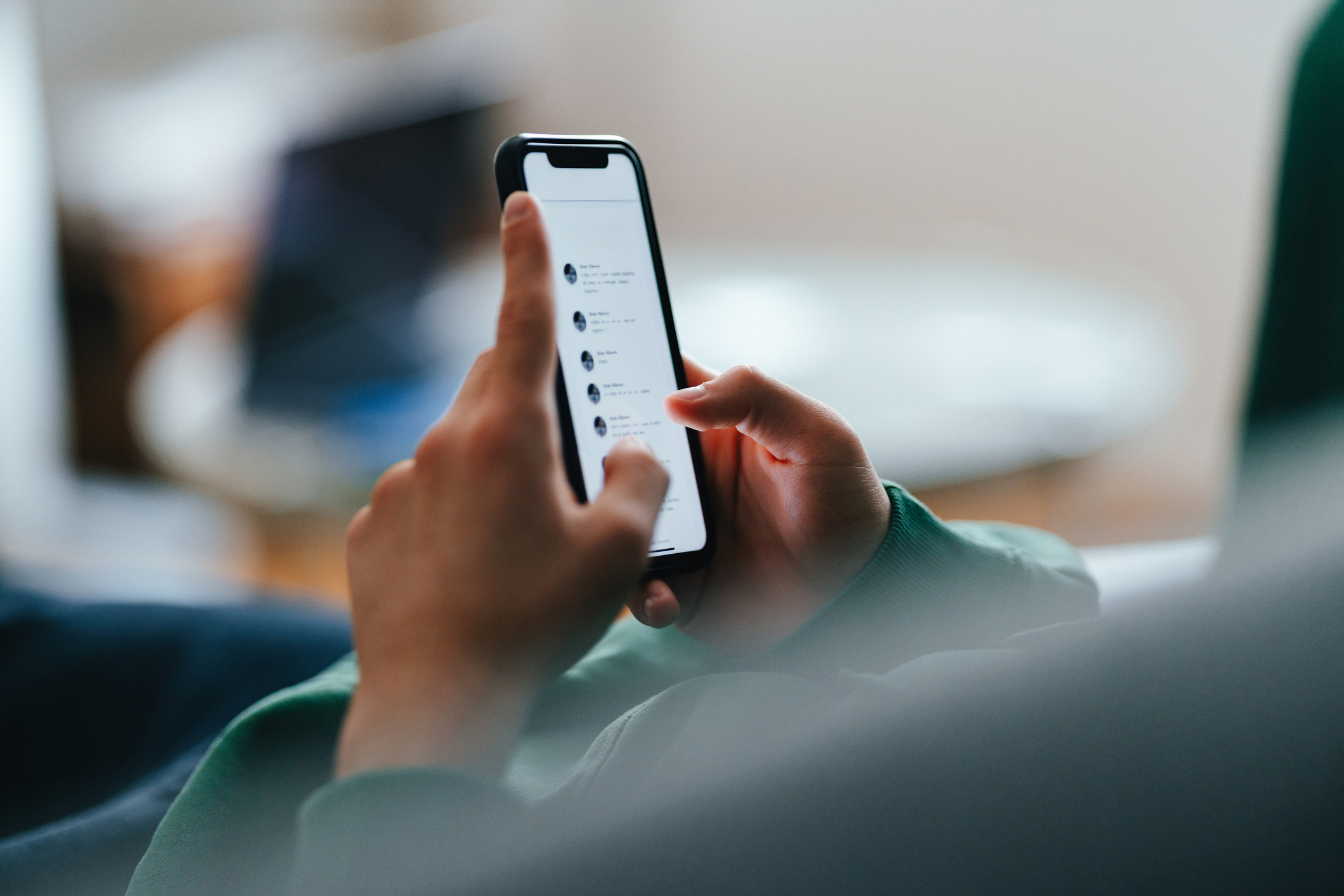 Teenager using social media stock image