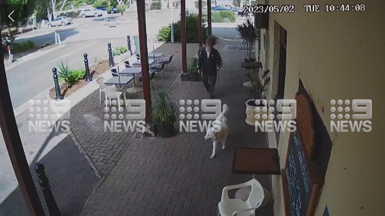 Sean Ferris walking his dog outside Foodland in South Australia.