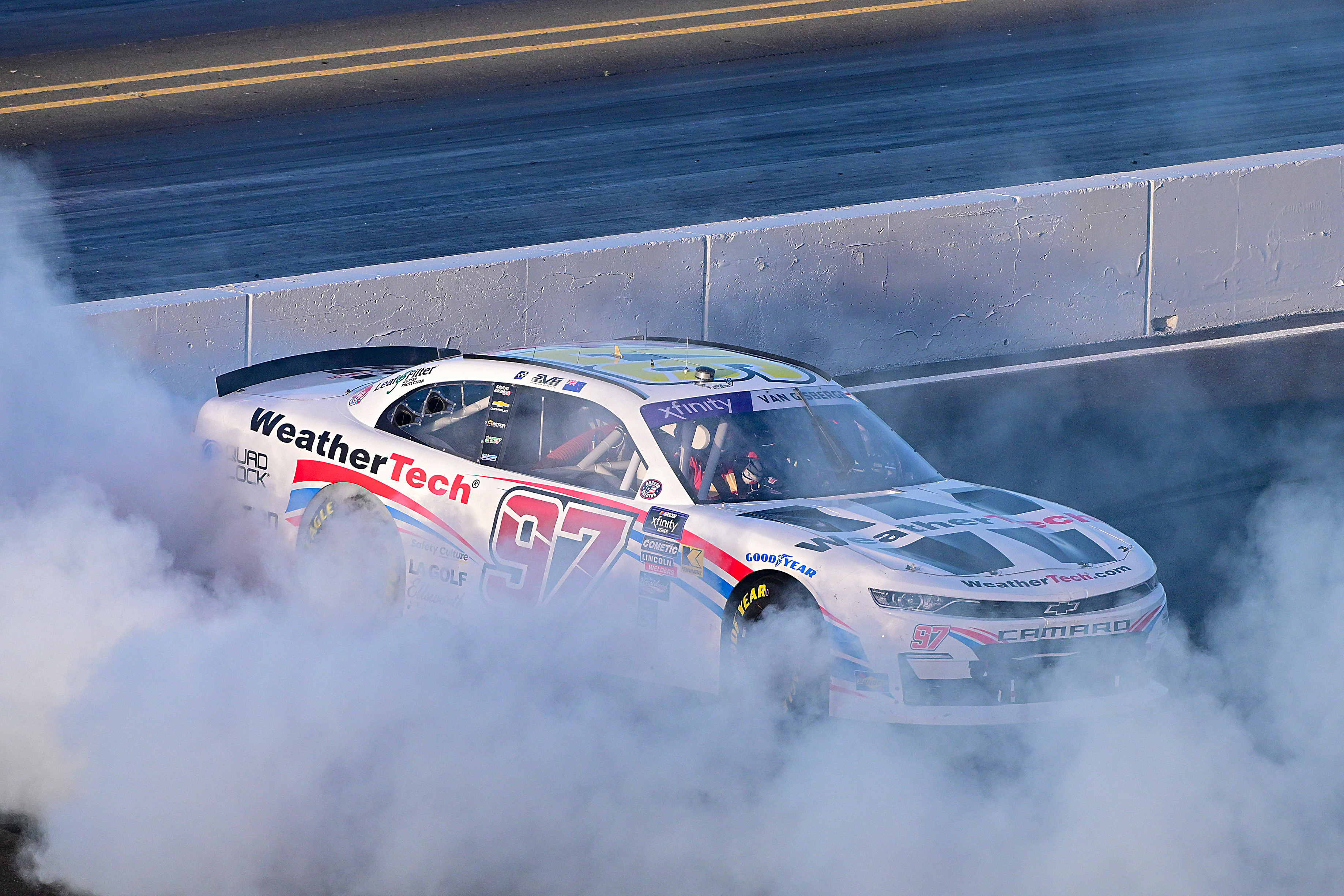 Shane van Gisbergen, driver of the No.97 Chevrolet Camaro, celebrates with a burnout.