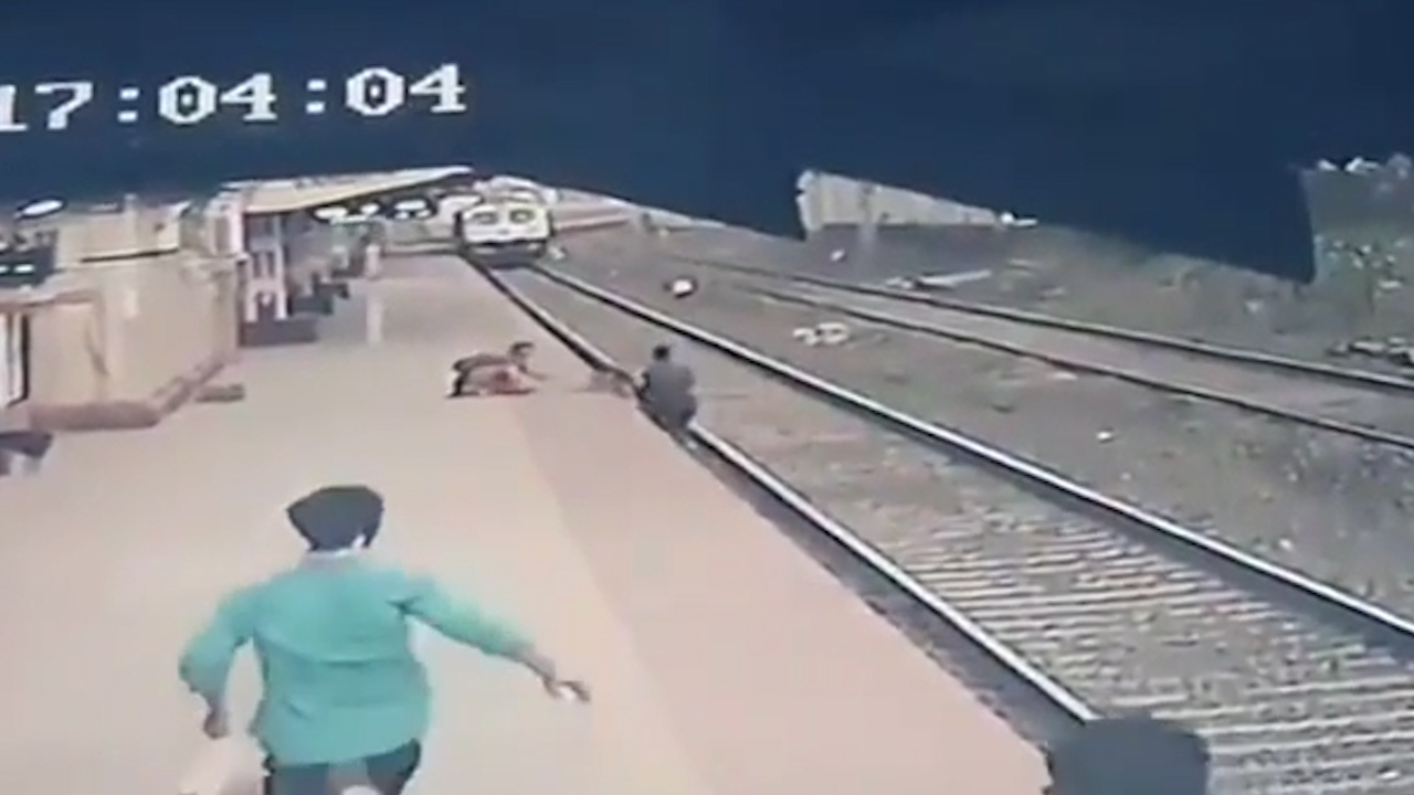 See the moment a child is saved from an oncoming train