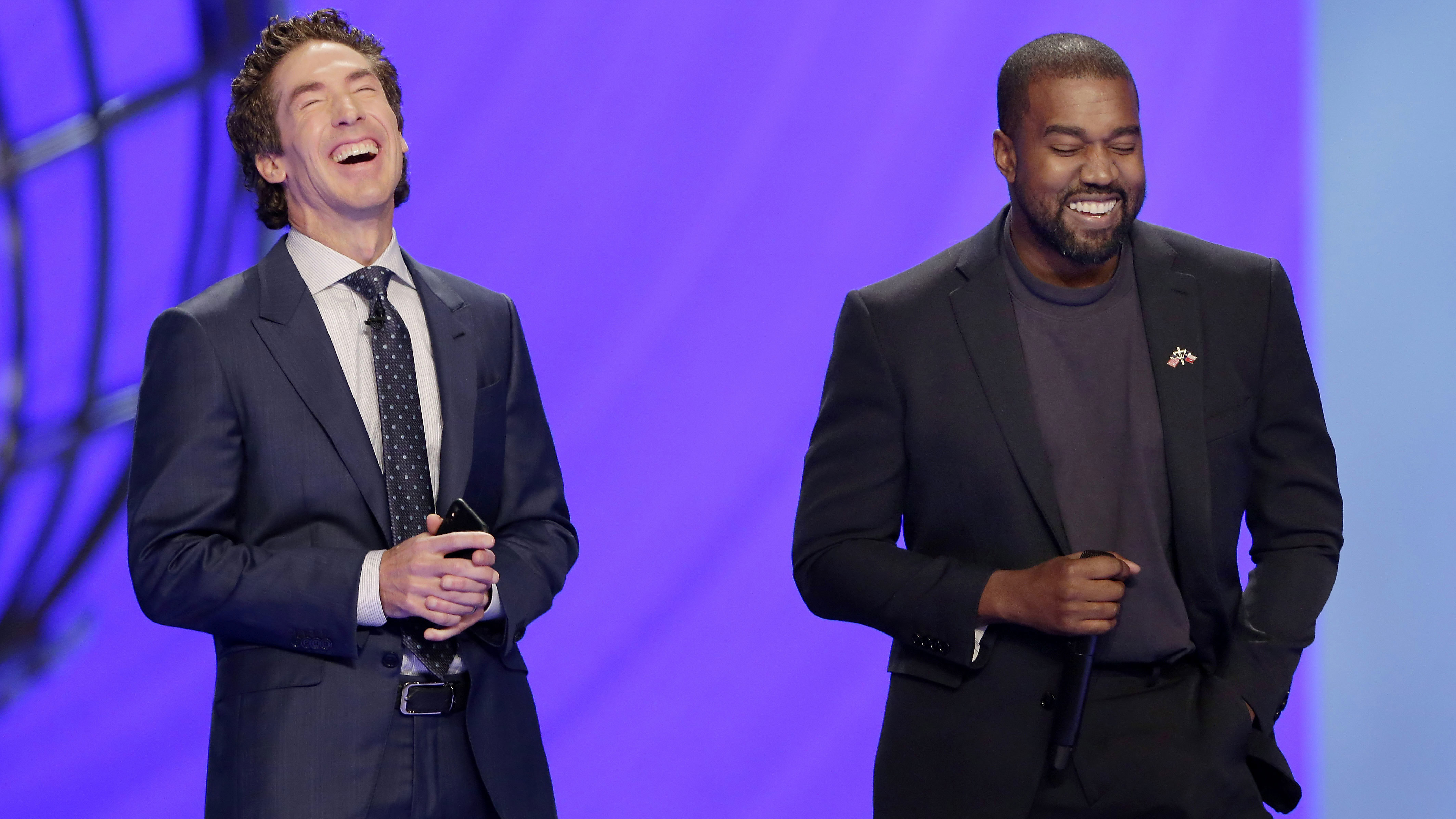 High profile pastor Joel Osteen has millions of followers worldwide. He is pictured here with Kanye West in 2019.