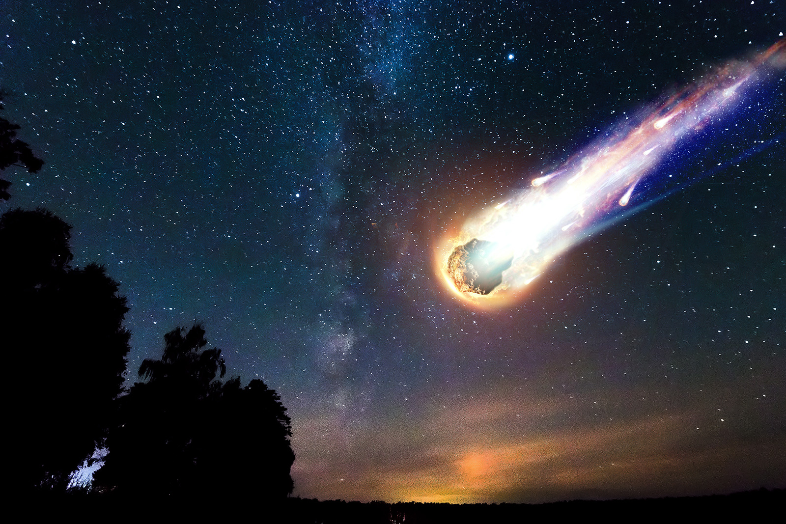 A comet, an asteroid, a meteorite falls to the ground against a starry sky, as researchers discovered the first known interstellar meteor to ever hit Earth. 