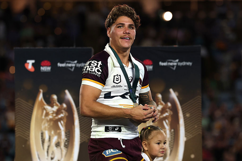 Reece Walsh of the Broncos receives his premiership ring.