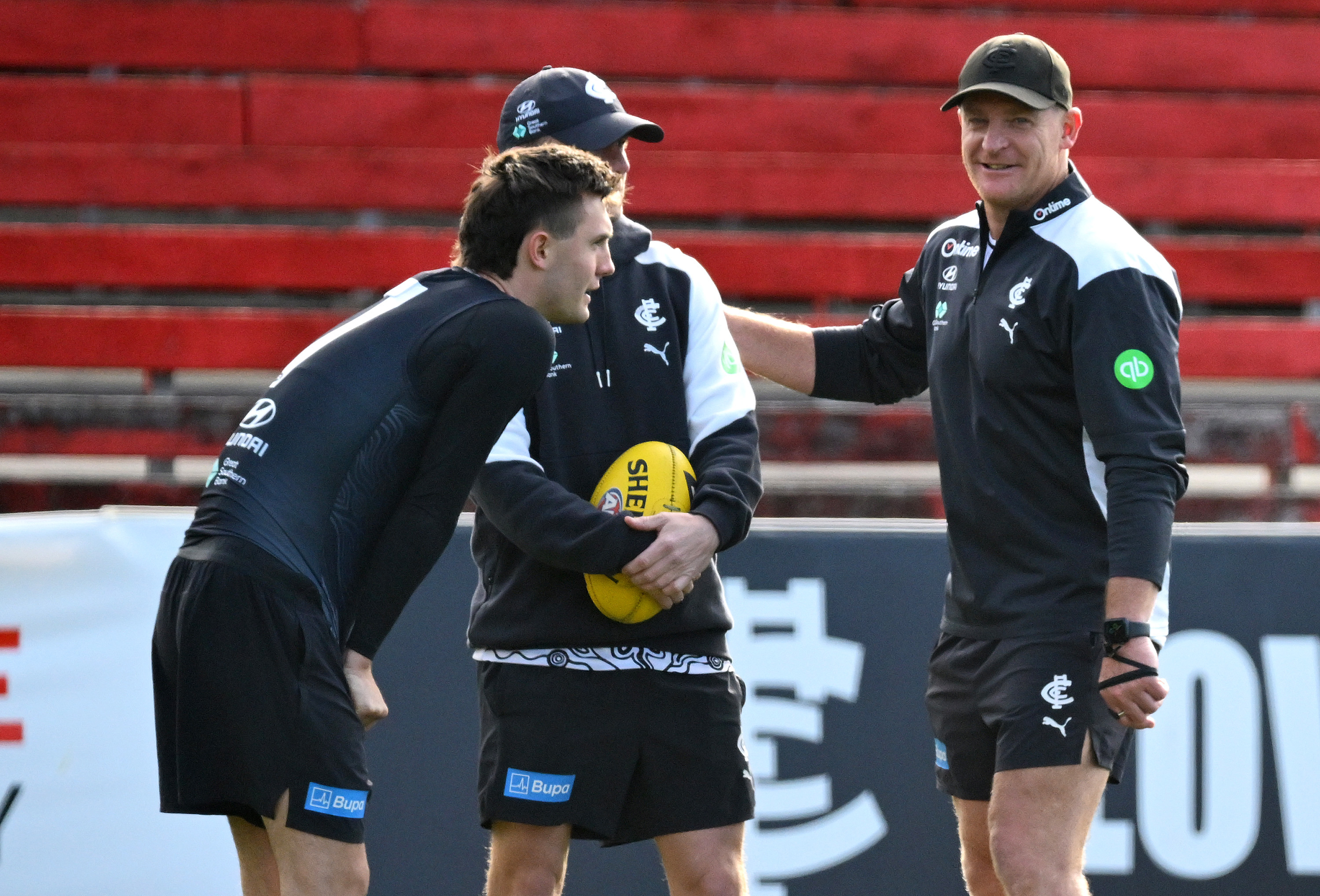 Michael Voss the coach of the Blues speaks to Jagga Smith at training in November.
