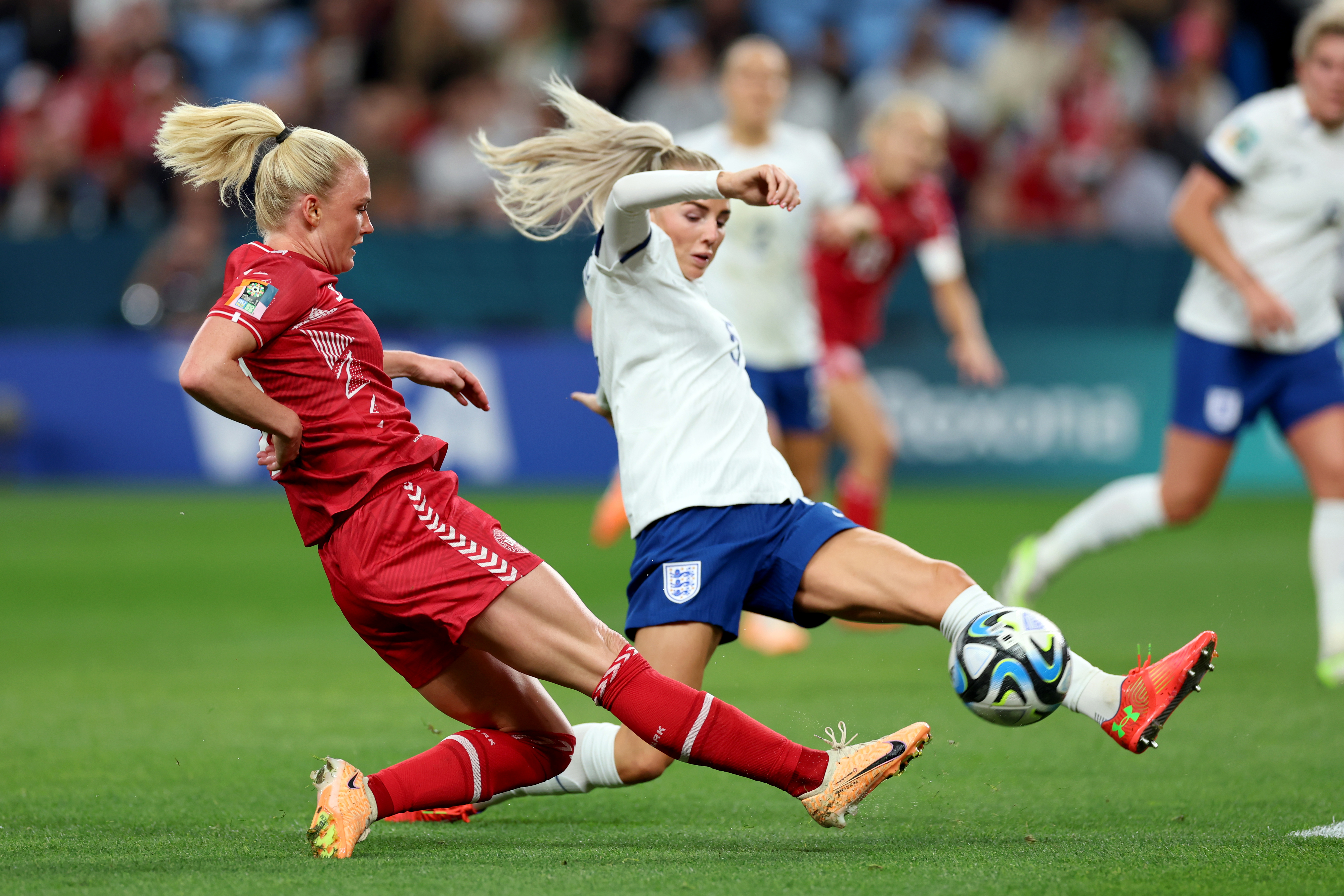 Rikke Madsen of Denmark Battle for the ball during the FIFA Women's World Cup Australia & New Zealand 2023 Group D match between England and Denmark at Sydney Football Stadium on July 28, 2023 in Sydney, Australia. (Photo by Sajad Imanian/DeFodi Images via Getty Images)