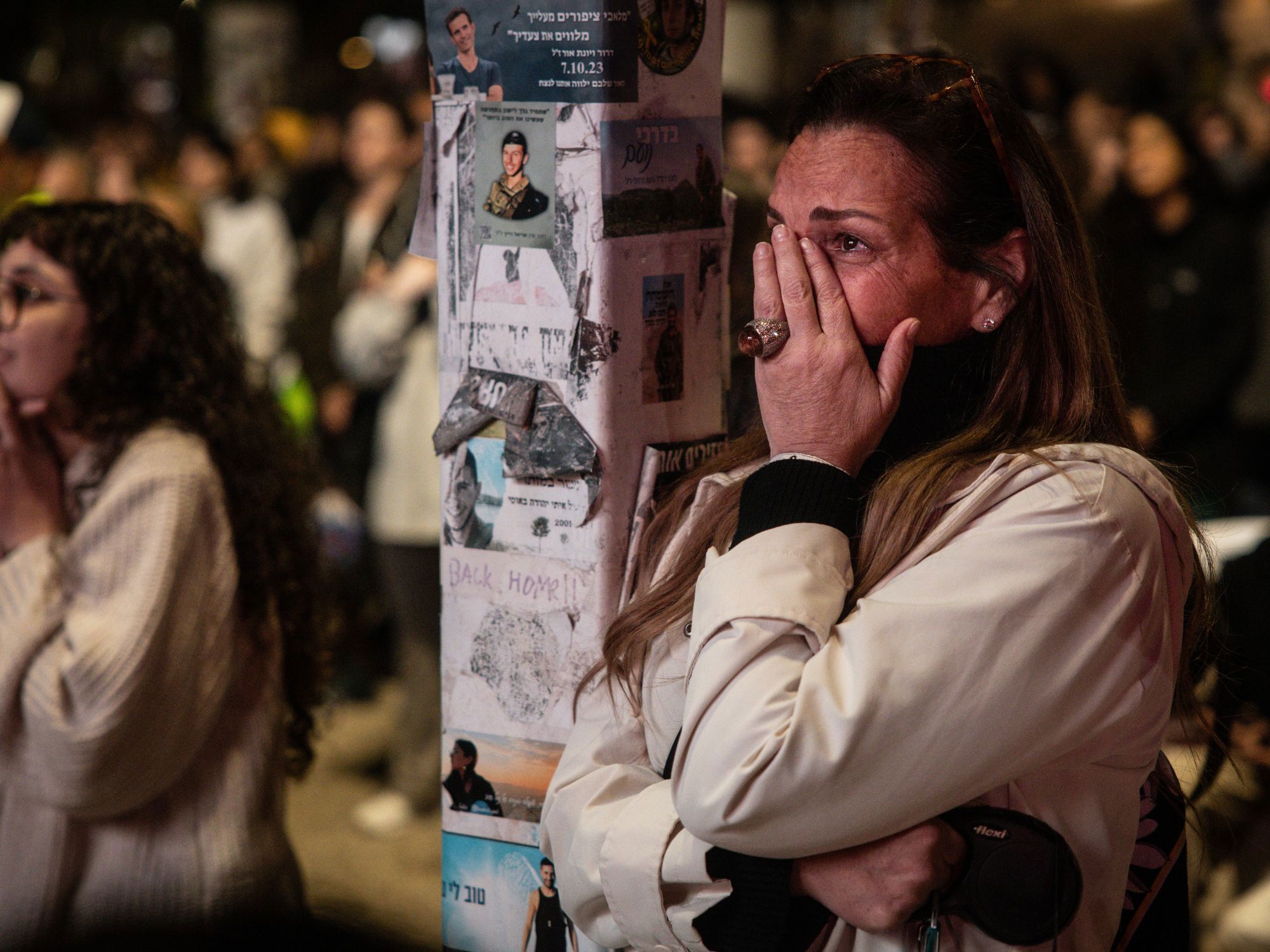  People cheer as the hostages arrive at Sheba Medical Center, also known as Tel HaShomer Hospital, where hostages are arriving after the first phase of a ceasefire agreement began between Israel and Hamas on January 19, 2025 in Ramat Gan, Israel. 