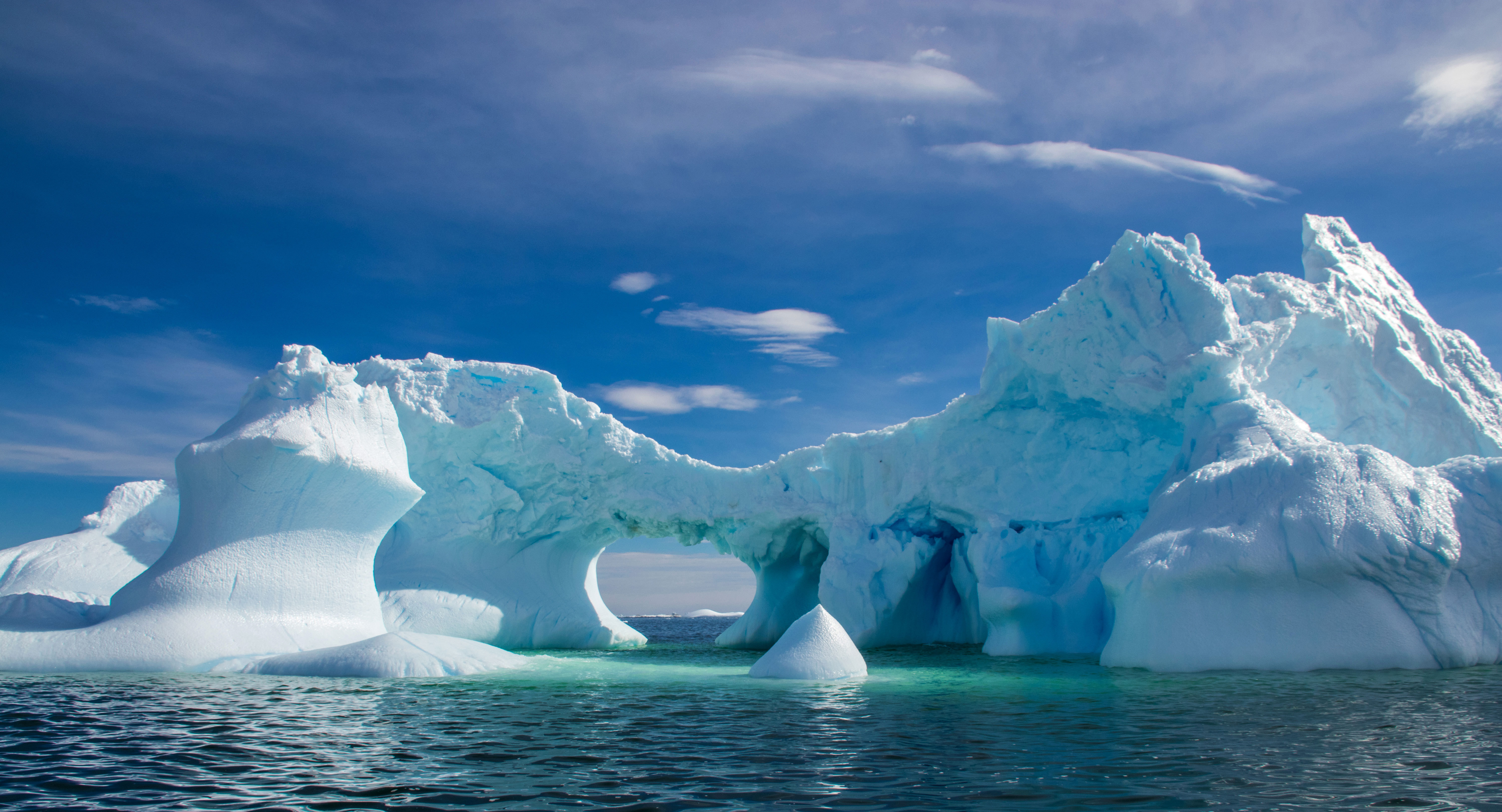 Less sea ice means more waves battering the ice shelves in front of the glaciers