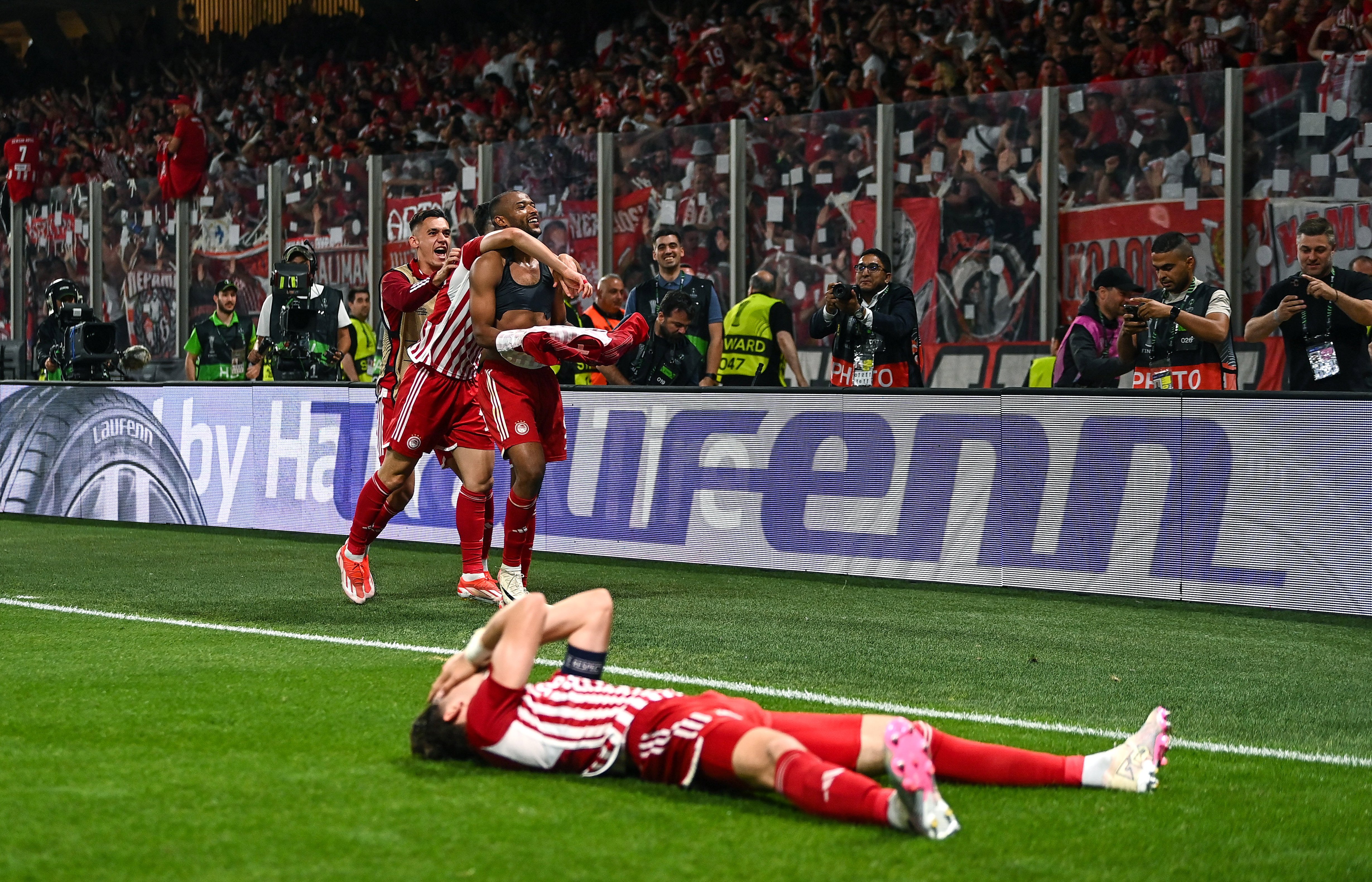 Ayoub El Kaabi of Olympiakos celebrates after scoring at the AEK Arena.