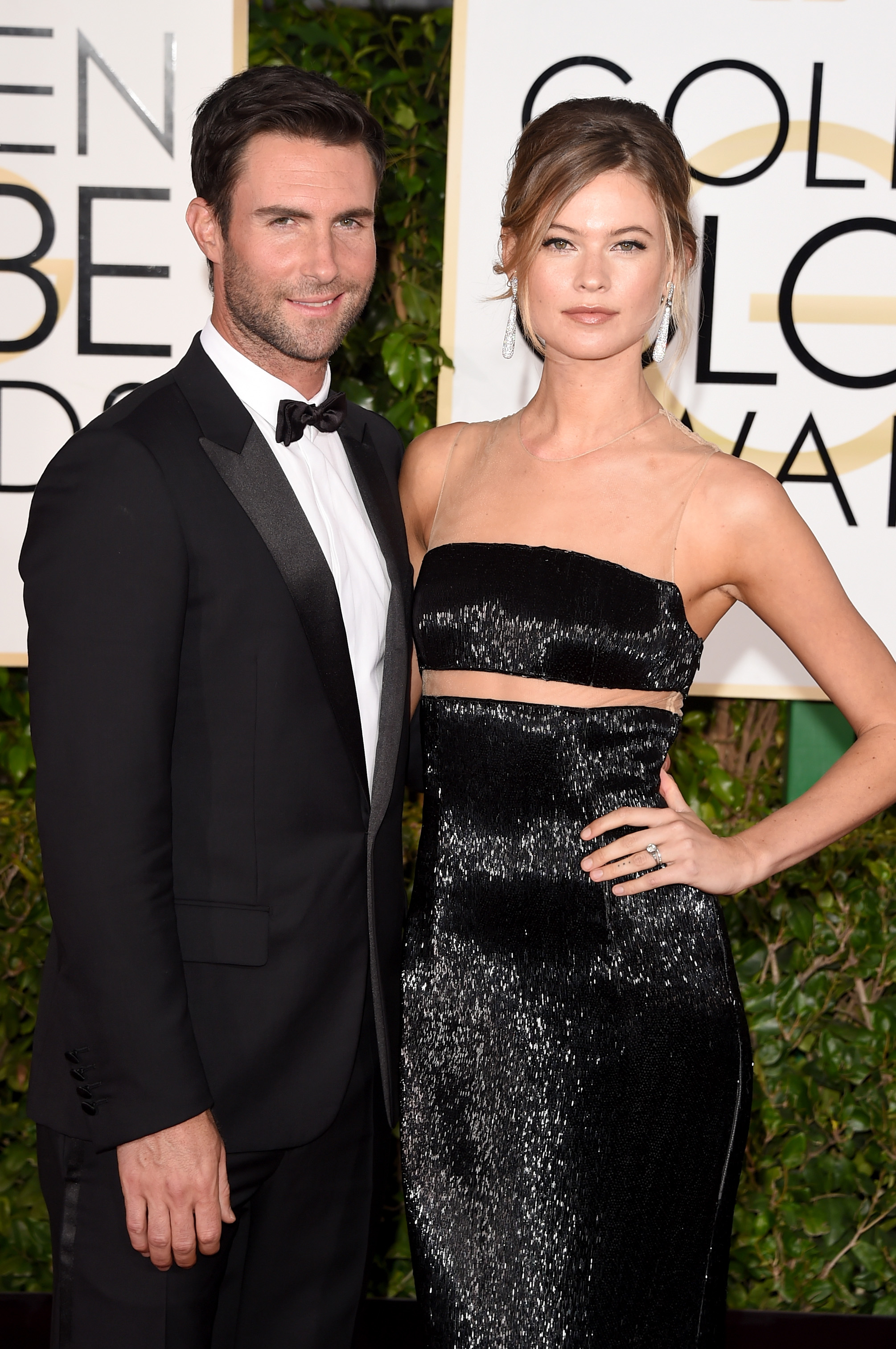 Adam Levine and Behati Prinsloo attend the 72nd Annual Golden Globe Awards at The Beverly Hilton Hotel on January 11, 2015 in Beverly Hills, California.