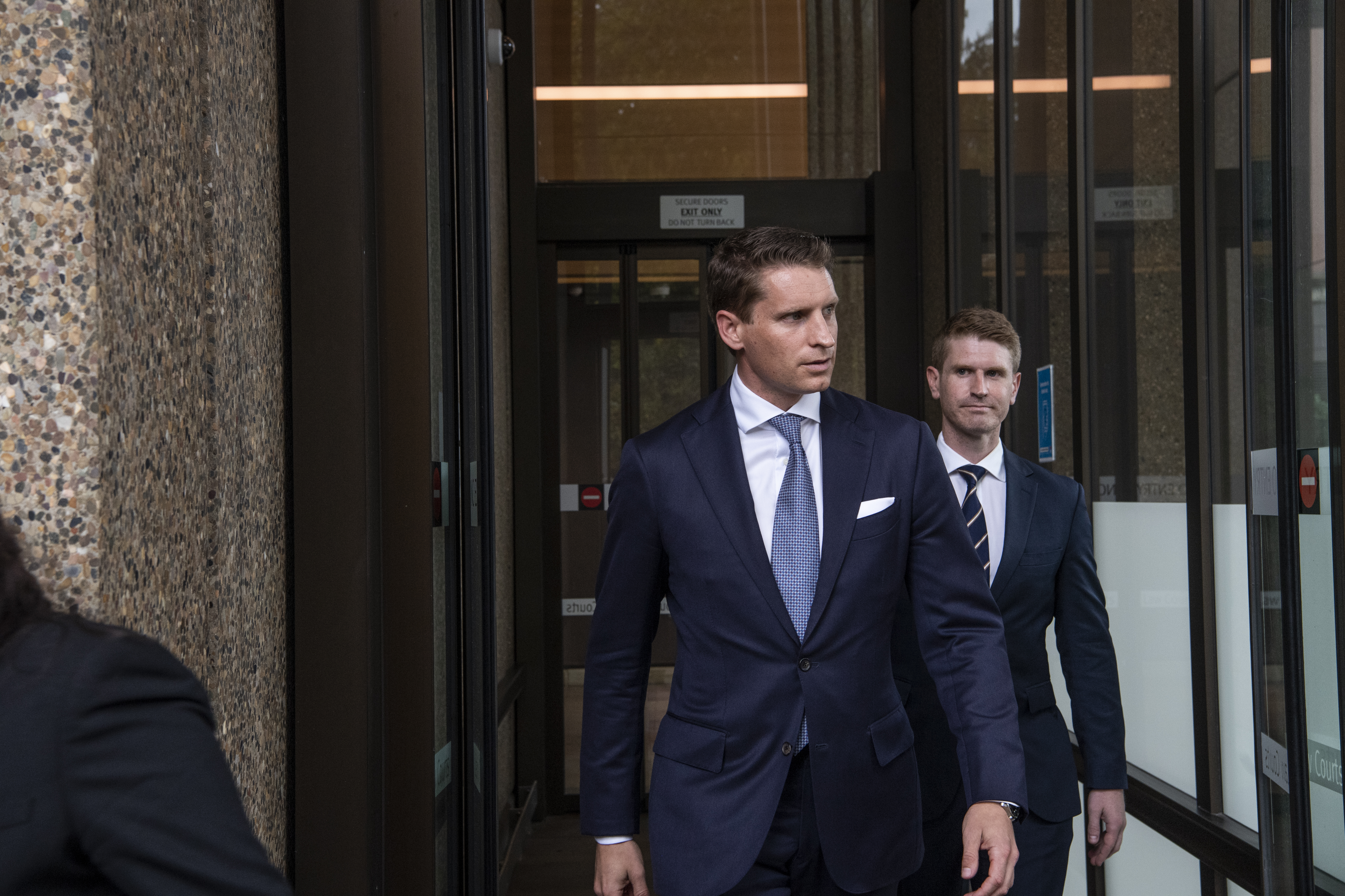 Andrew Hastie leaving Federal Court. 