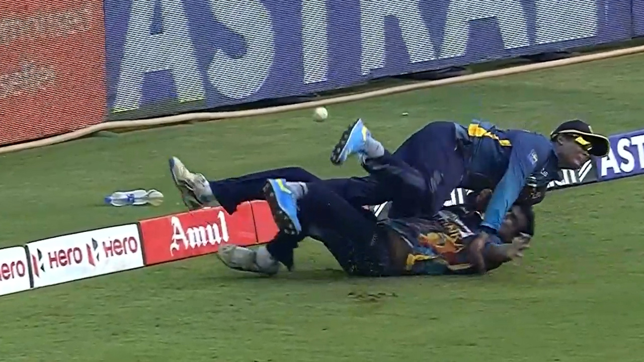 Ashen Bandara and Jeffrey Vandersay collide during the one day match between India and Sri Lanka.