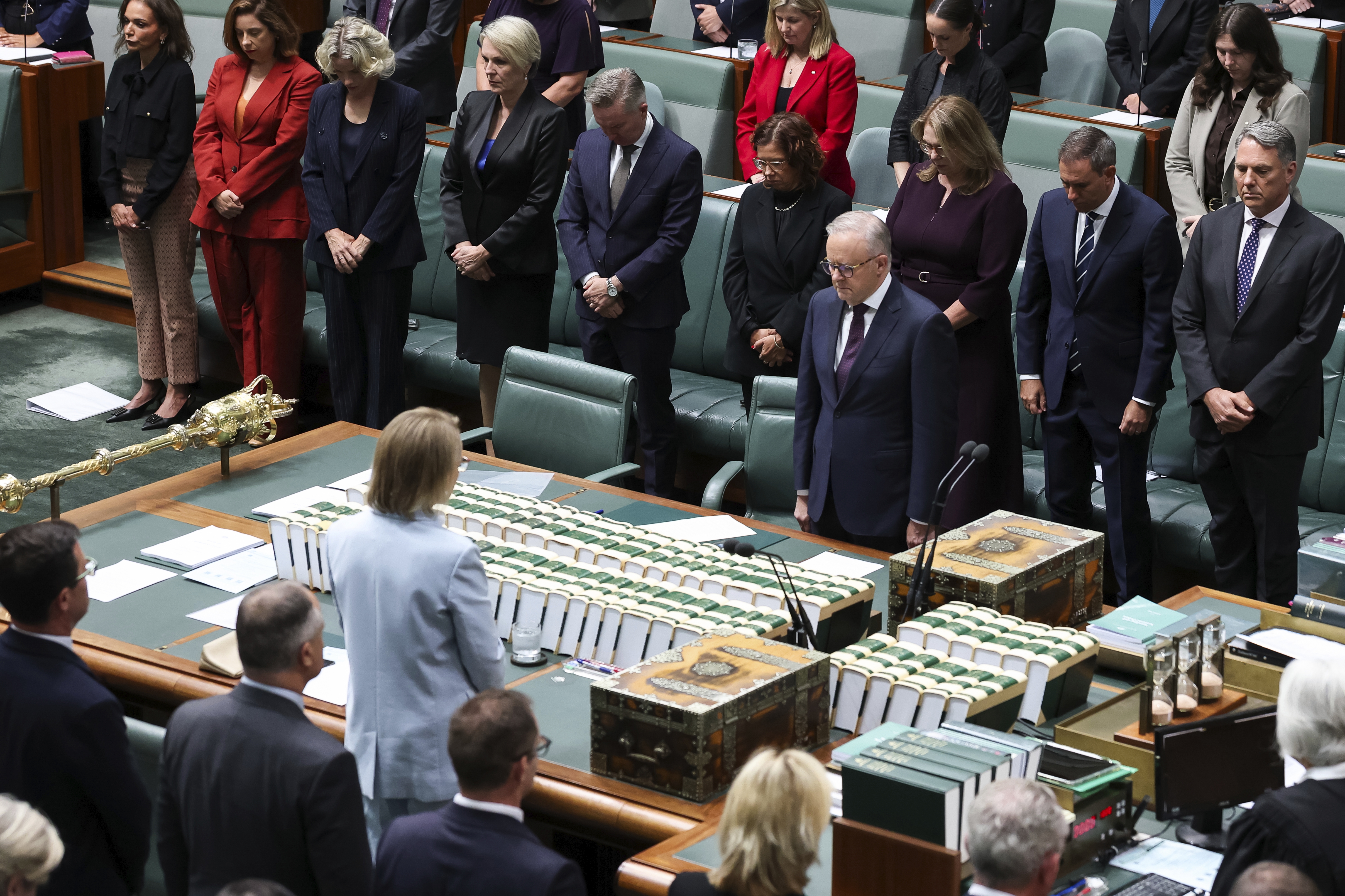 Prime Minister Anthony Albanese and Members of the House of Representatives observe a minutes silence as a mark of respect during a condolence motion in relation to the victims of the Bondi antisemitic terror attack, in the House of Representatives at Parliament House in Canberra on Monday 19 January 2026.