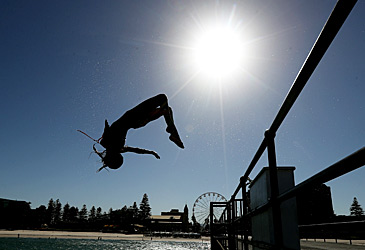 Diver leaping of Glenelg Beach pier (AAP)