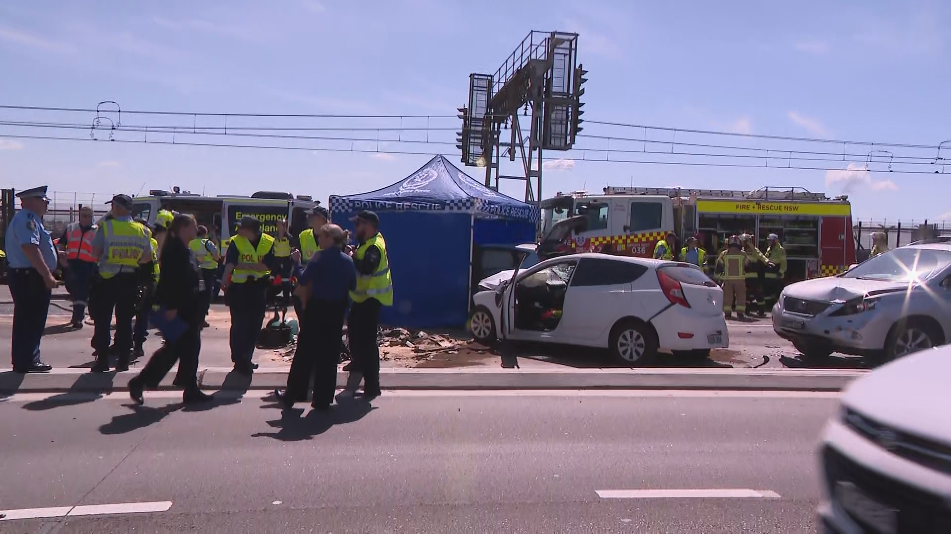 Three hatchbacks and potentially a fourth luxury vehicle were involved in the crash. Sydney Harbor Bridge crash 