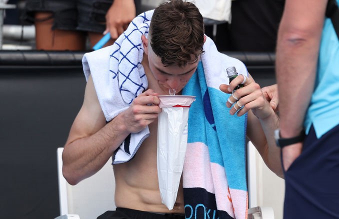 Jack Draper throws up after his big win.