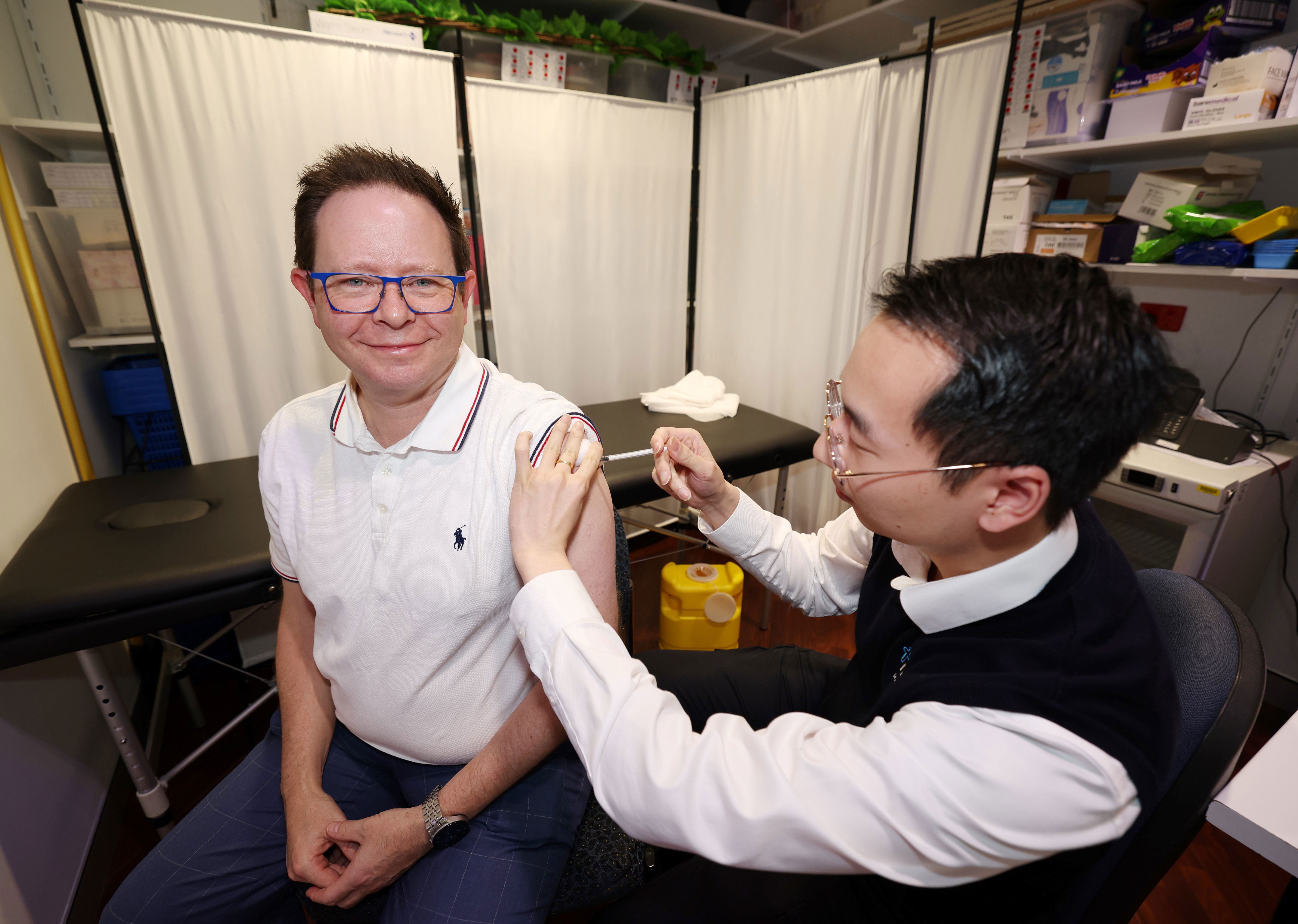 Paul Griffin gets his flu shots. 