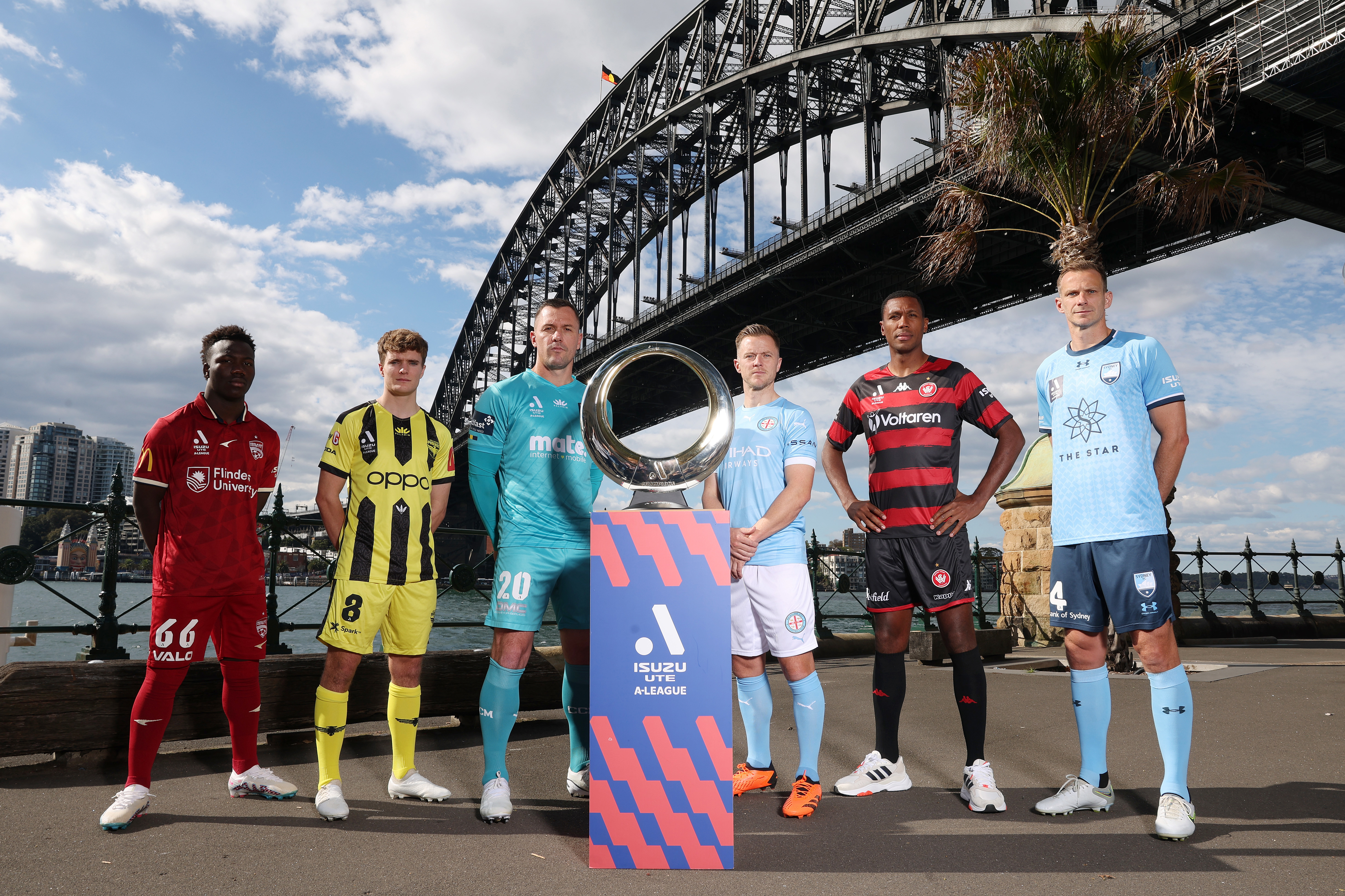 A-League players with the trophy.