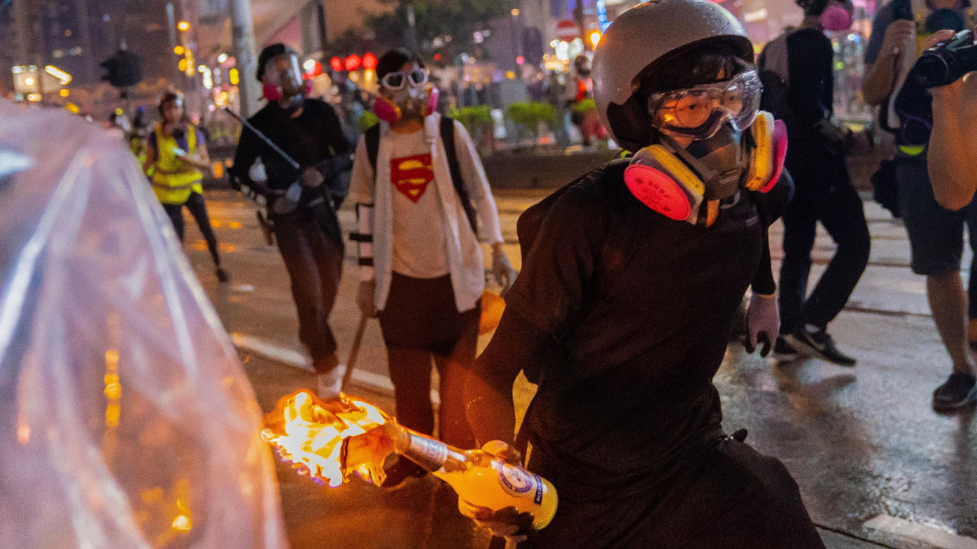 A Molotov cocktail is hurled during Hong Kong's protests. 