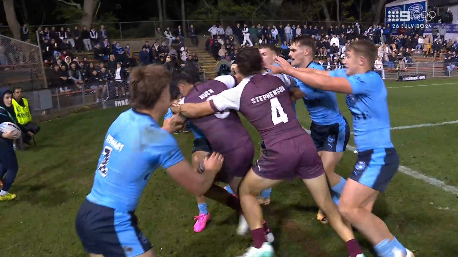 Blues and Maroons players clash at Leichhardt.