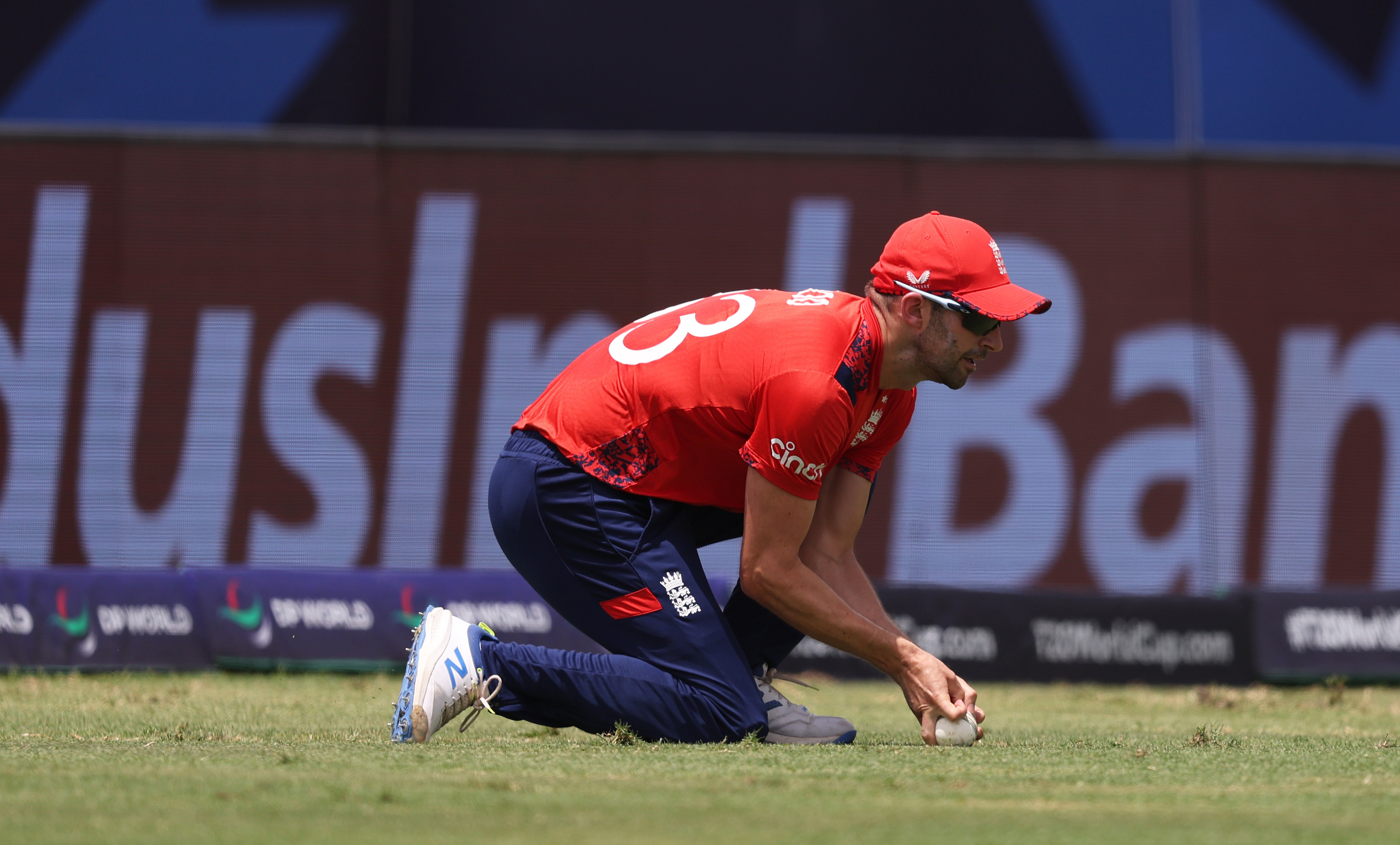 Mark Wood of England takes a catch to dismiss Quinton de Kock of South Africa only to be given not out on review.