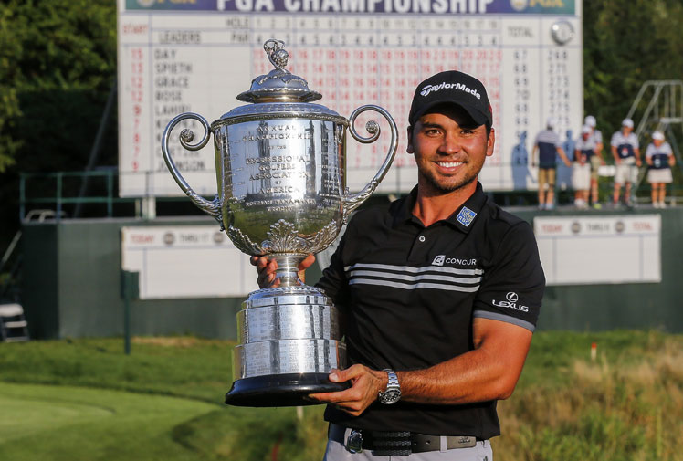 Jason Day holds aloft the Wanamaker trophy.