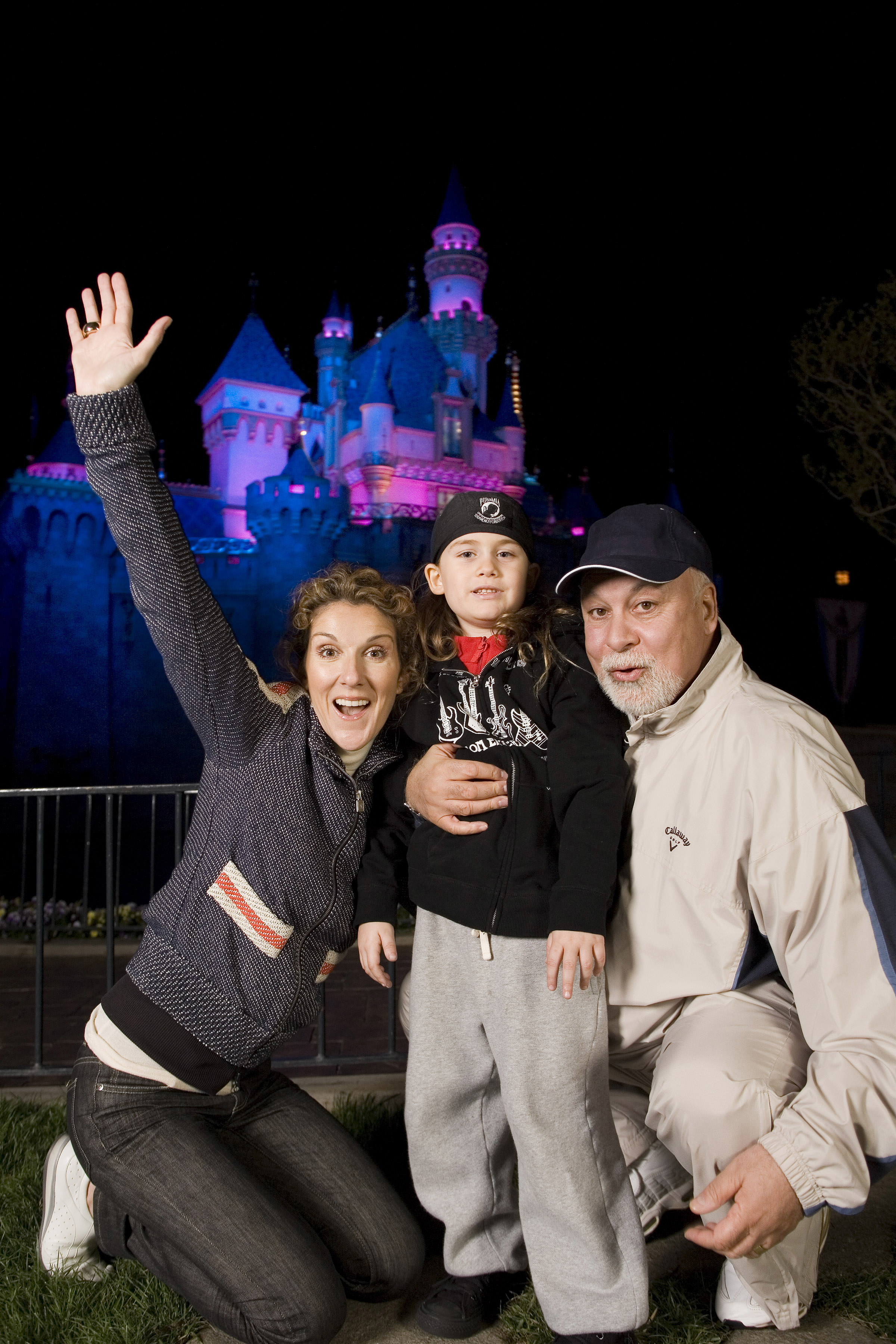 Celine Dion, son Rene-Charles, then 6, and husband Rene Angelil﻿ in Disneyland California in 2007,
