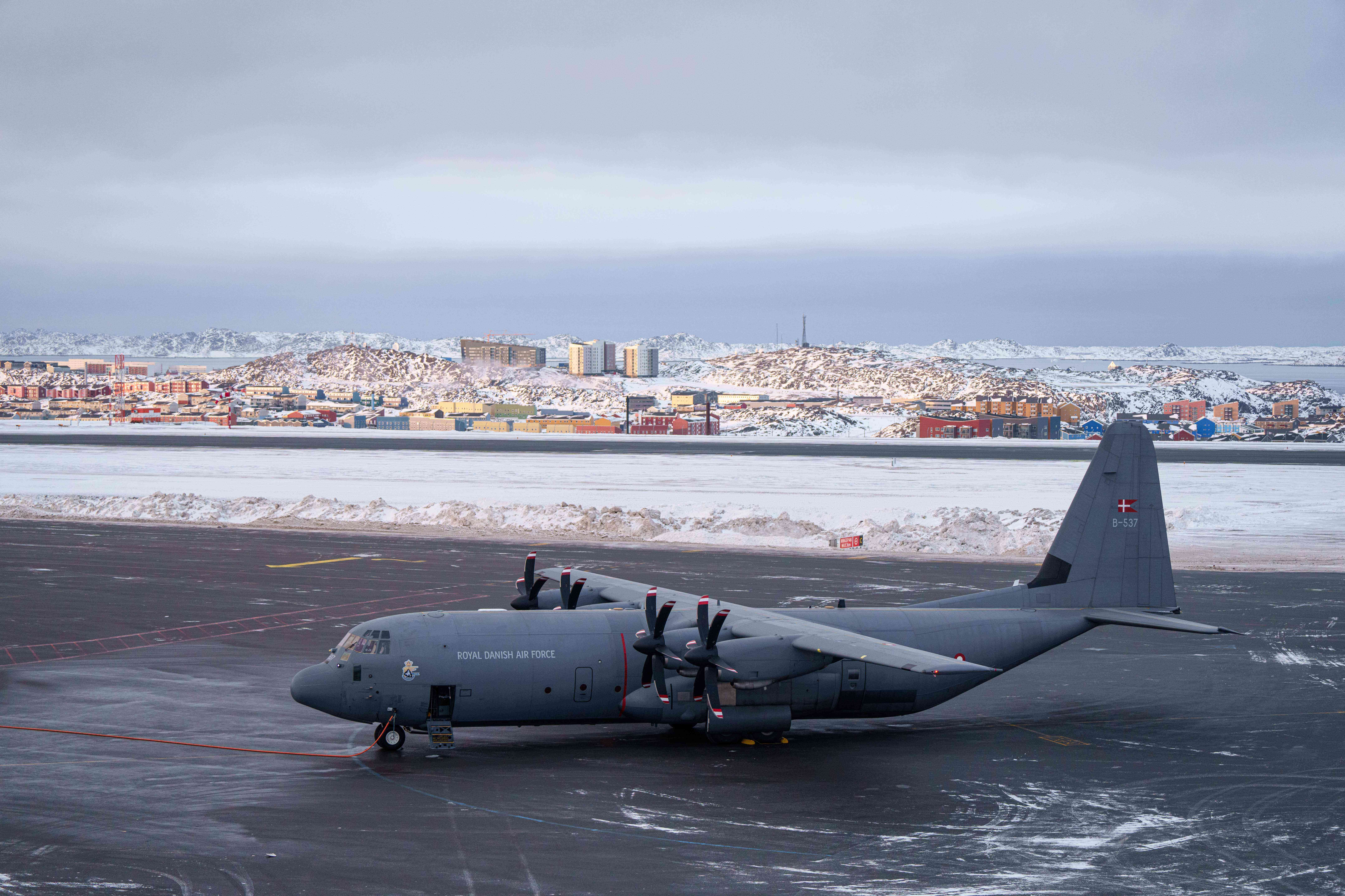 A Royal Danish Air Force military plane is seen at the airport of Nuuk, Greenland, on Thursday, Jan. 15, 2026.