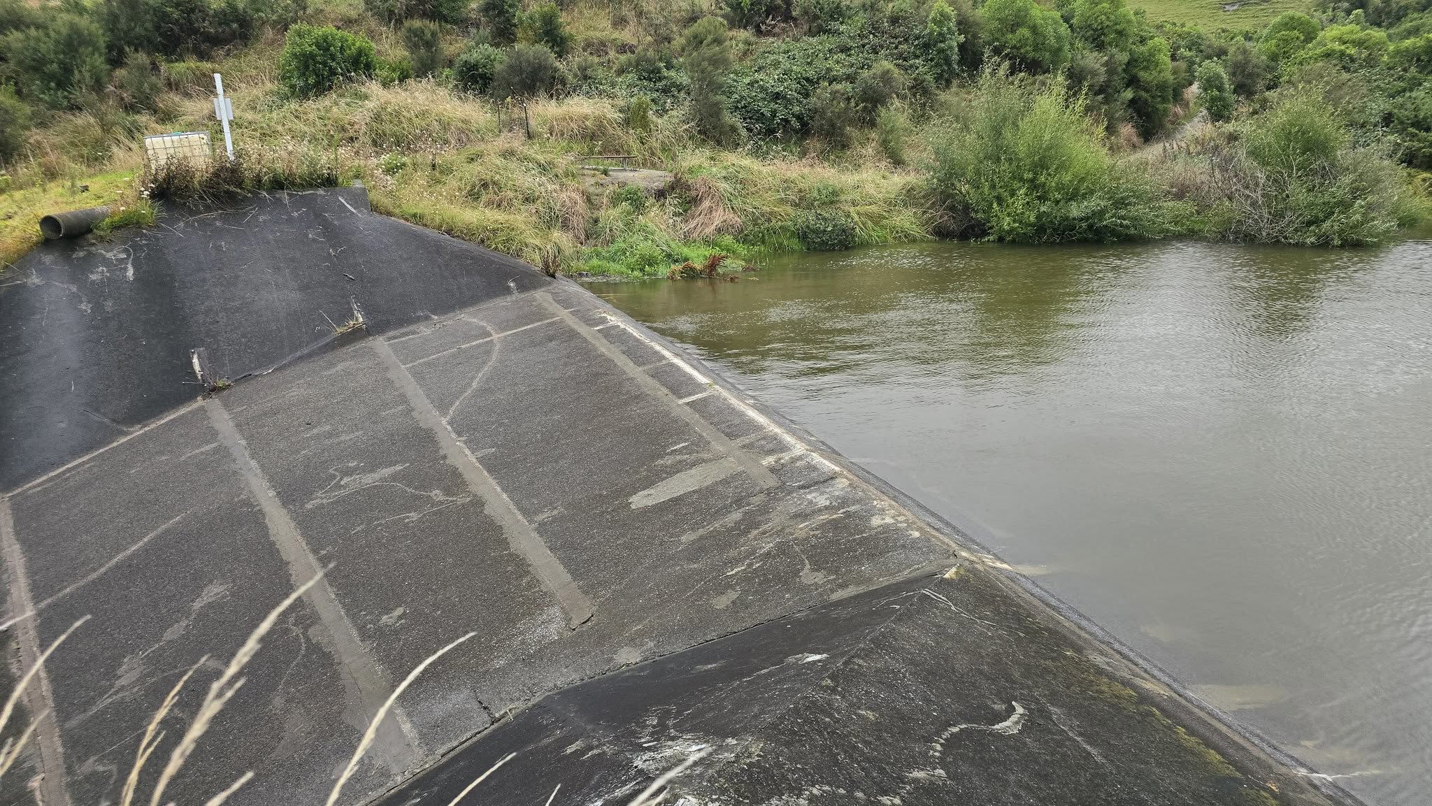 A man has been killed, thousands of properties are without power, and flights have been cancelled as wild storms lash large parts of New Zealand.