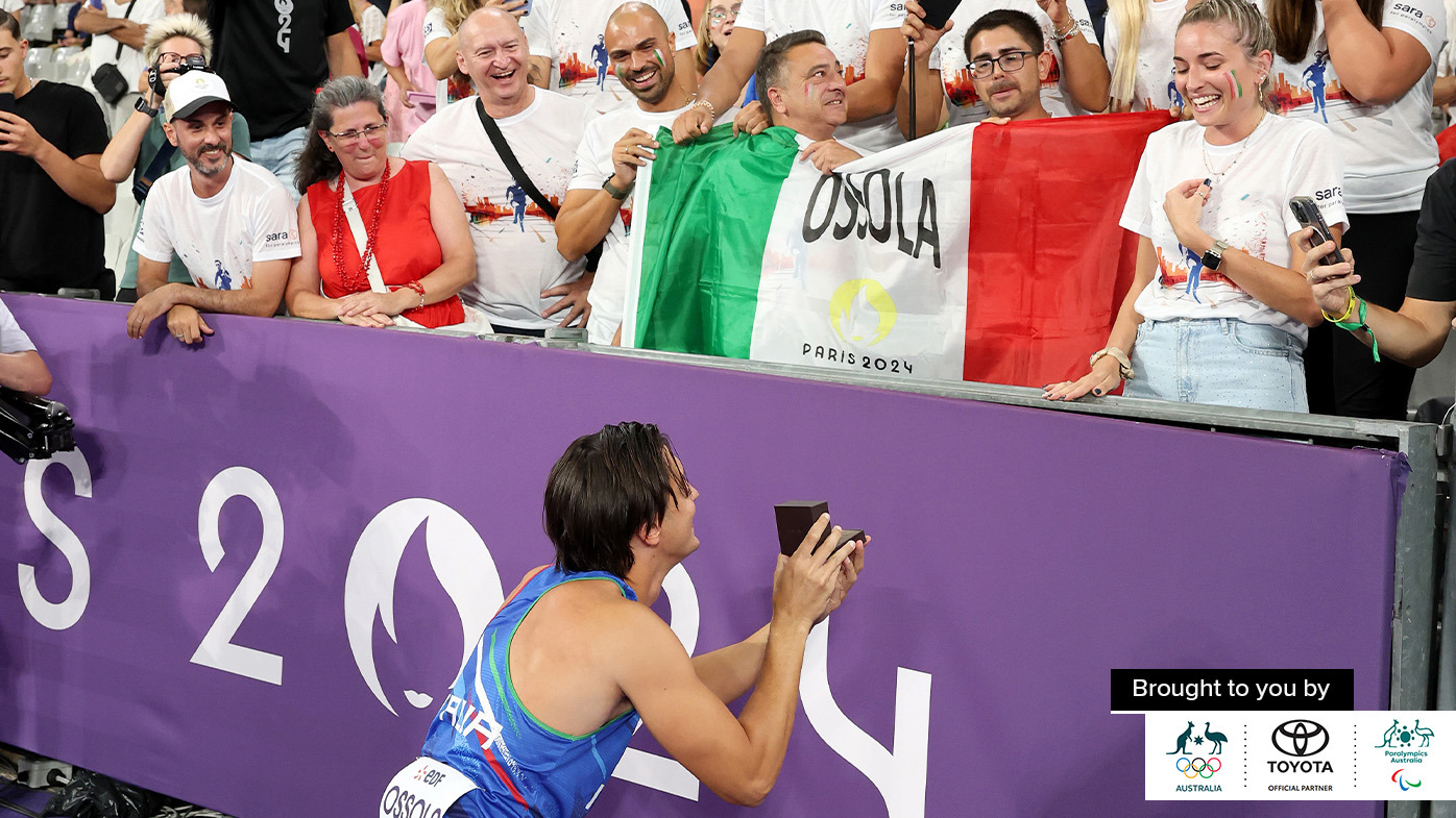 Alessandro Ossola of Team Italy proposes to his girlfriend, after the Men's 100m - T63 at Stade de France.