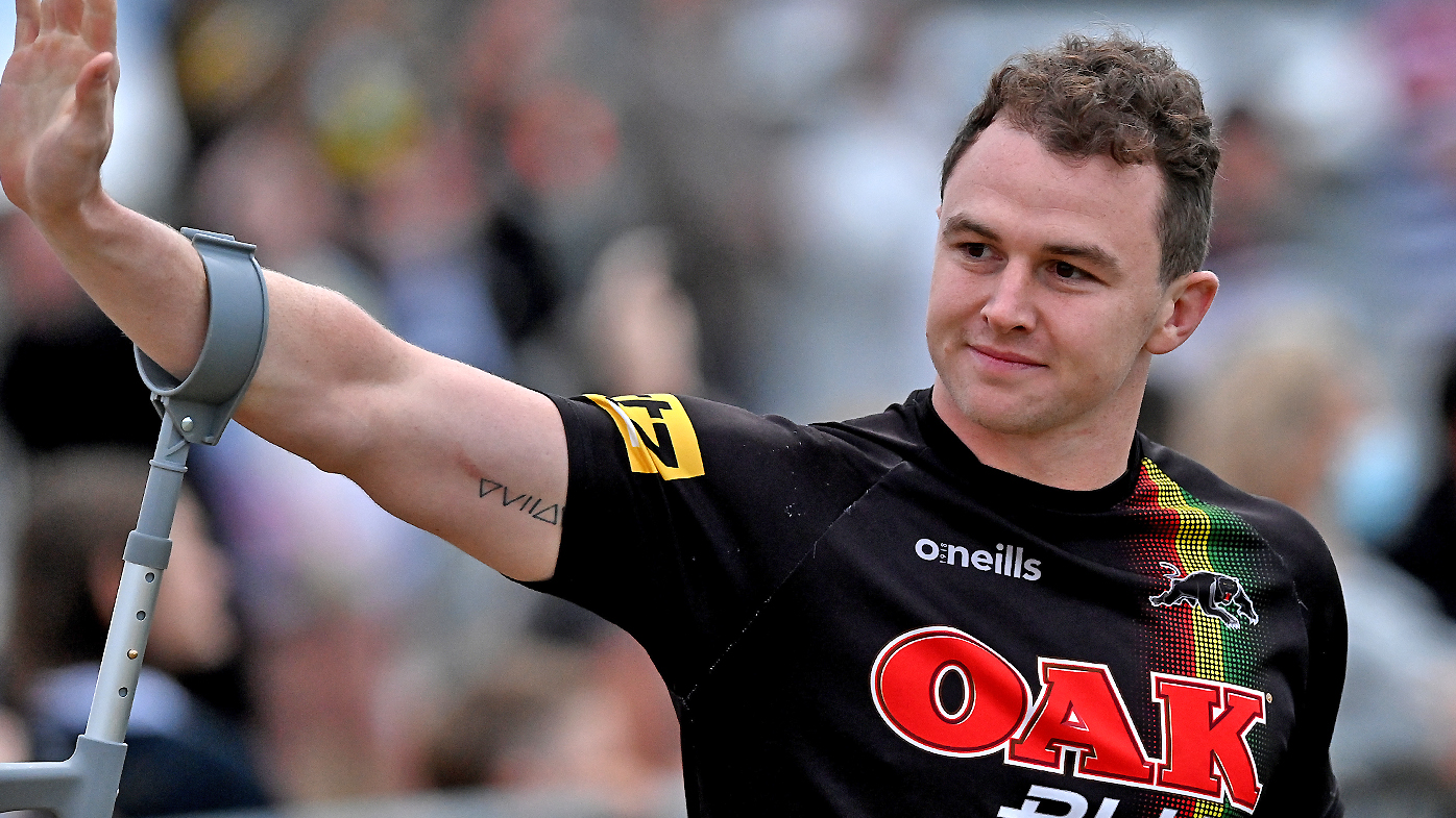 Dylan Edwards greets fans during a Penrith Panthers NRL training session