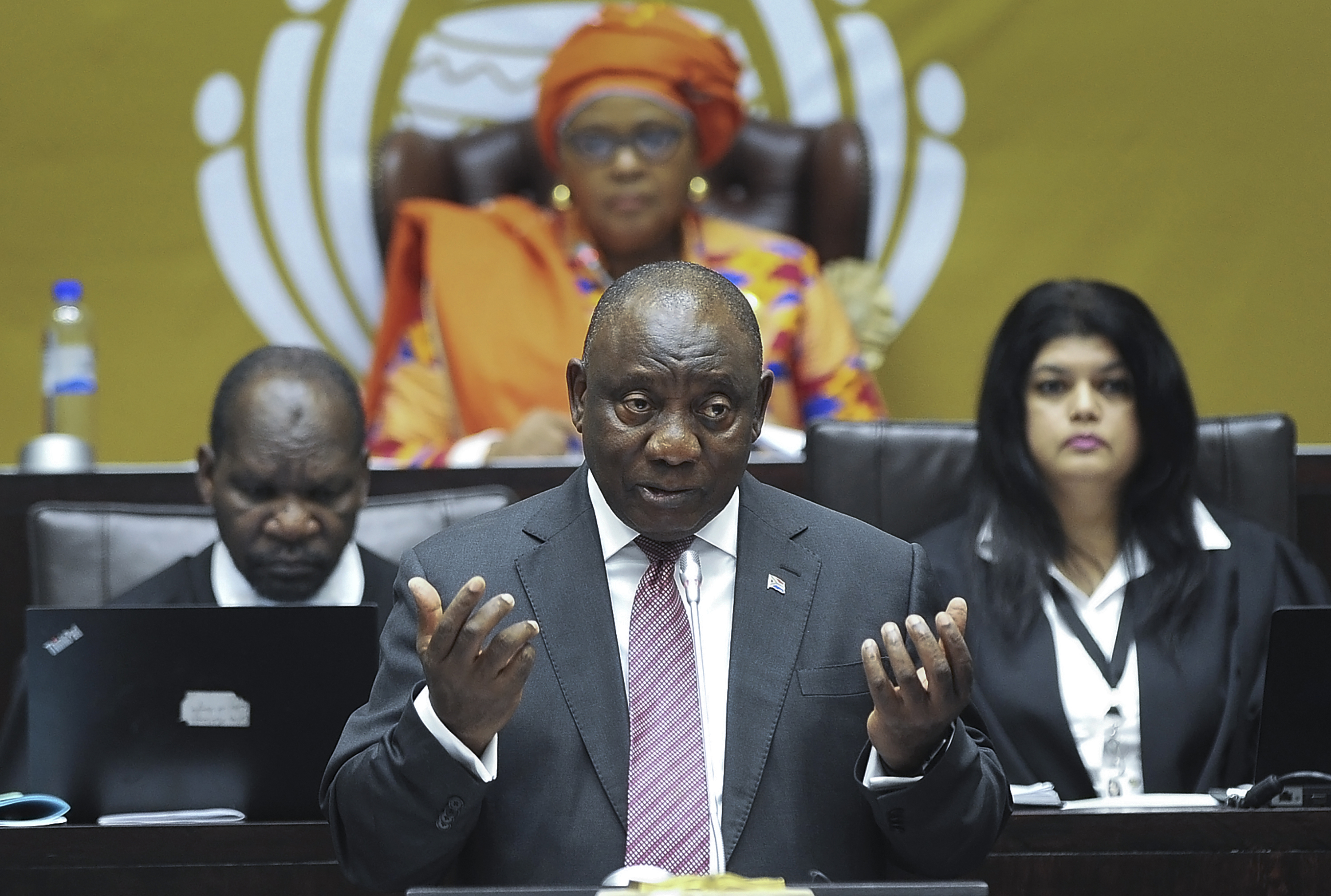 South African President Cyril Ramaphosa answers questions in parliament in Cape Town, South Africa, Thursday, May 11, 2023.